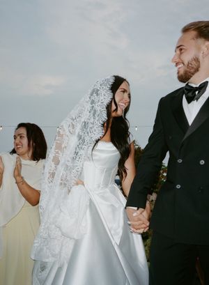 A series of five wedding photos showing a couple sharing joyful moments and laughter during their ceremony.