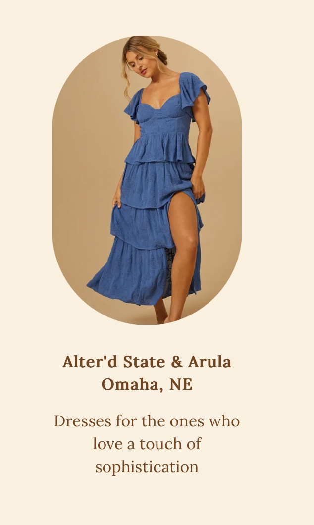 Model wearing blue tiered ruffle maxi dress with flutter sleeves from Alter'd State boutique in Omaha.