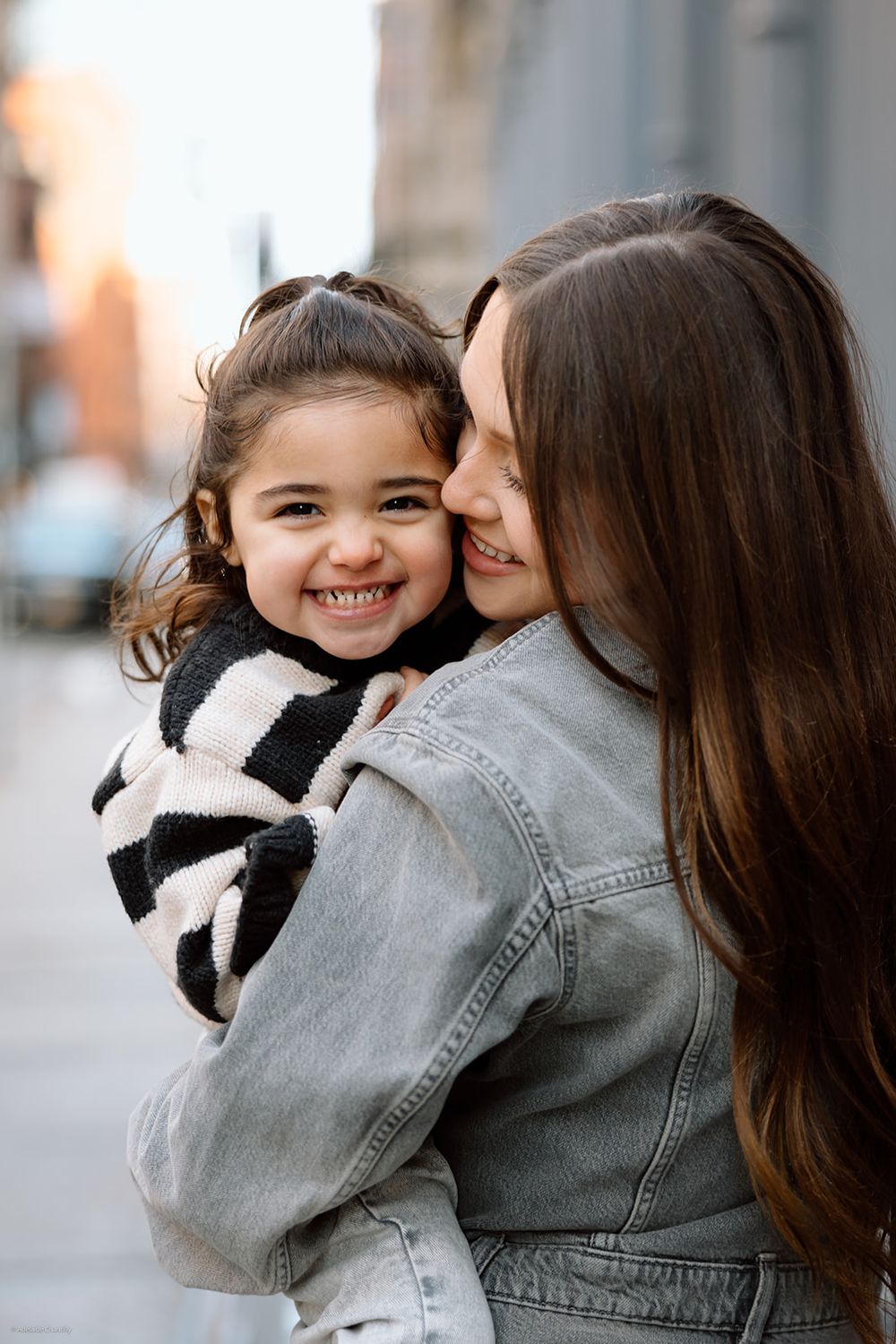 A candid, emotional photograph capturing connection, love, and storytelling through natural light and thoughtful composition.