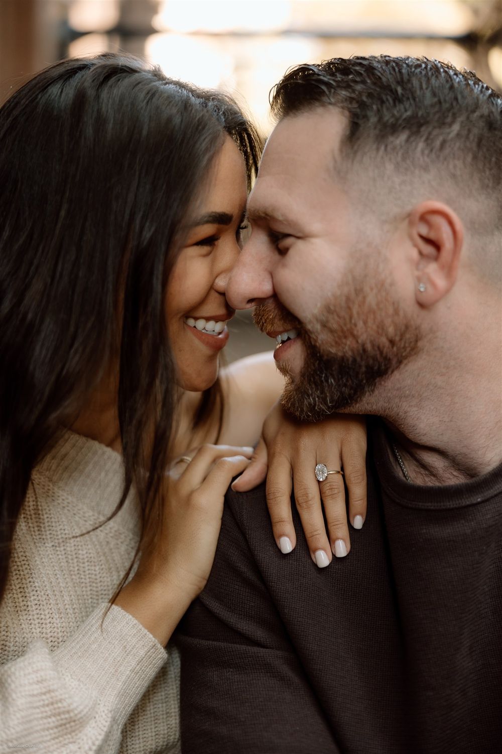 A candid, emotional photograph capturing connection, love, and storytelling through natural light and thoughtful composition.