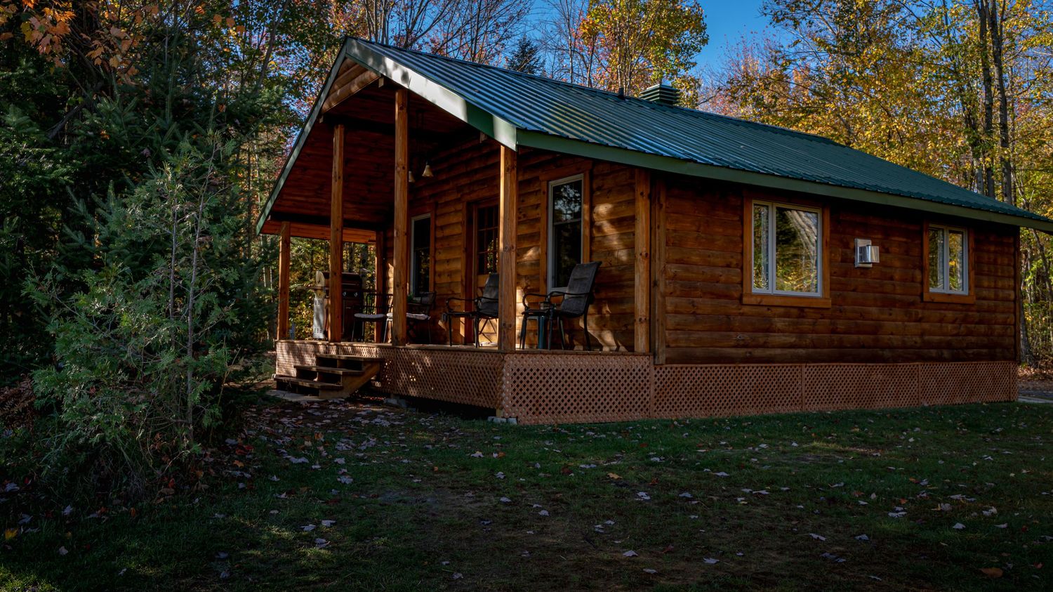 Wood cottage surrounded by forest at Domaine Labrador in Clarence Creek, Ontario.