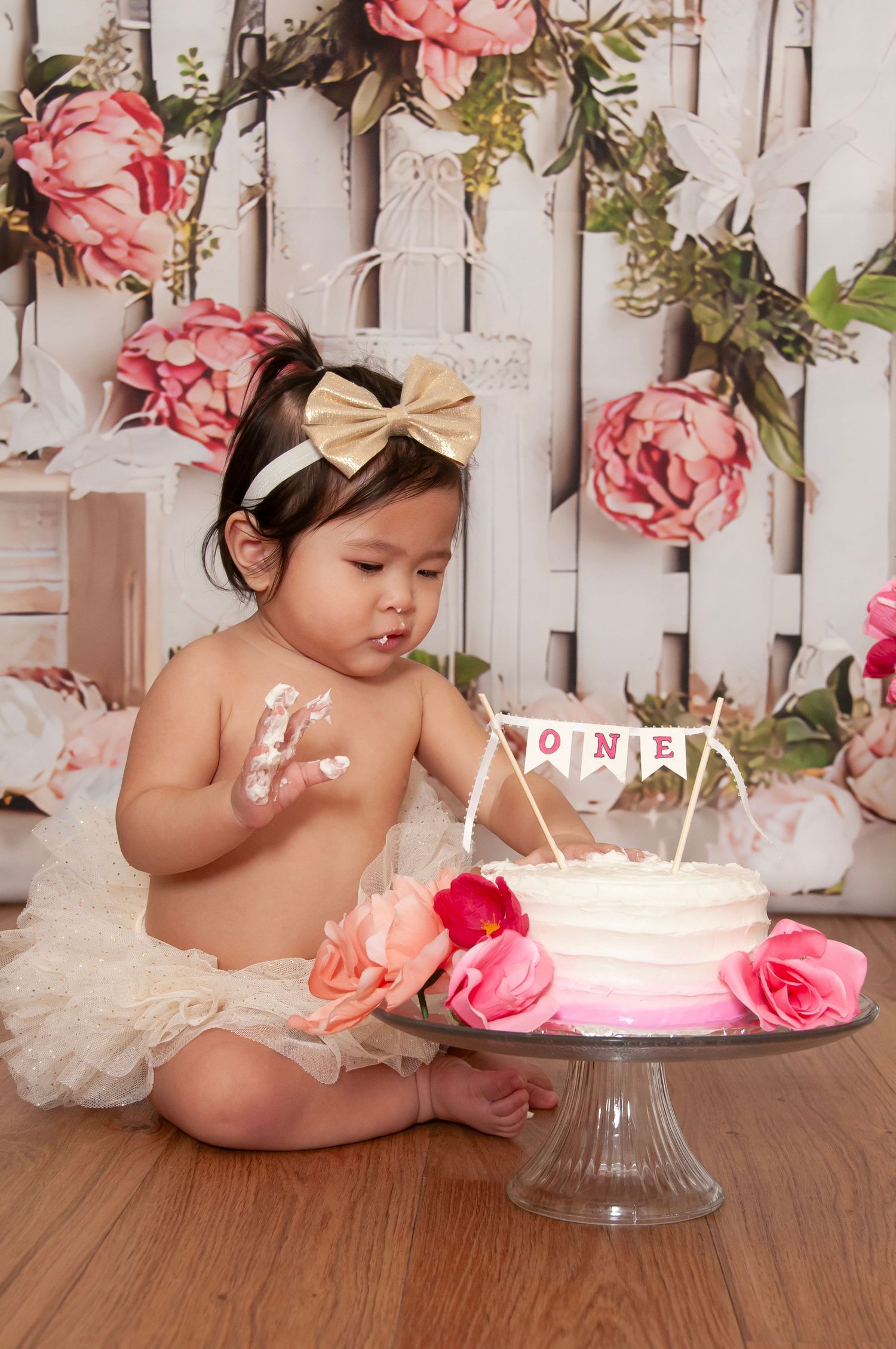 One year old cake smash with flowers