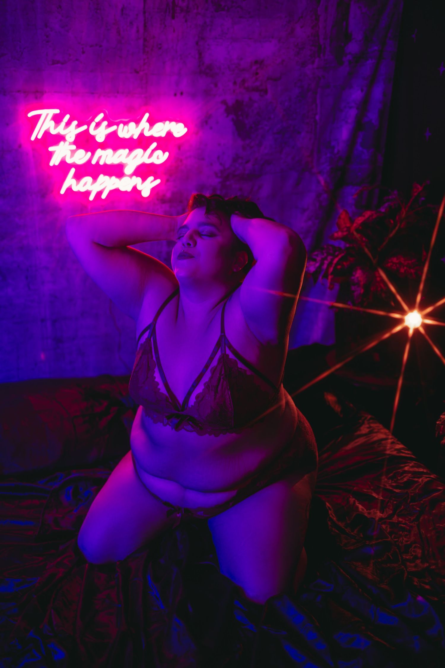 Plus size boudoir photoshoot with neon lights