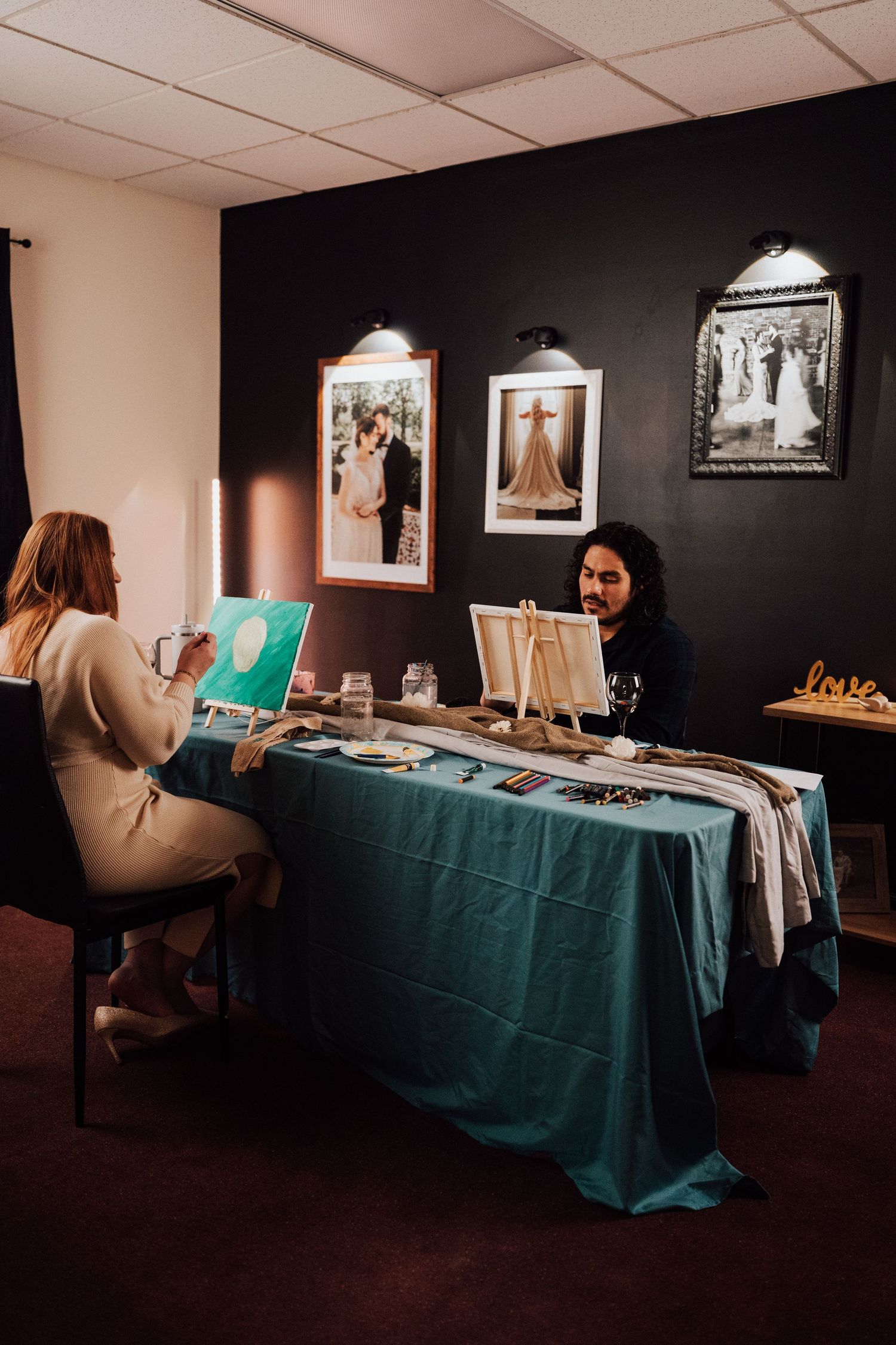 Engaged couple on date night at Sip & paint event at Nicolle Aponte Photography studio in Middletown, PA