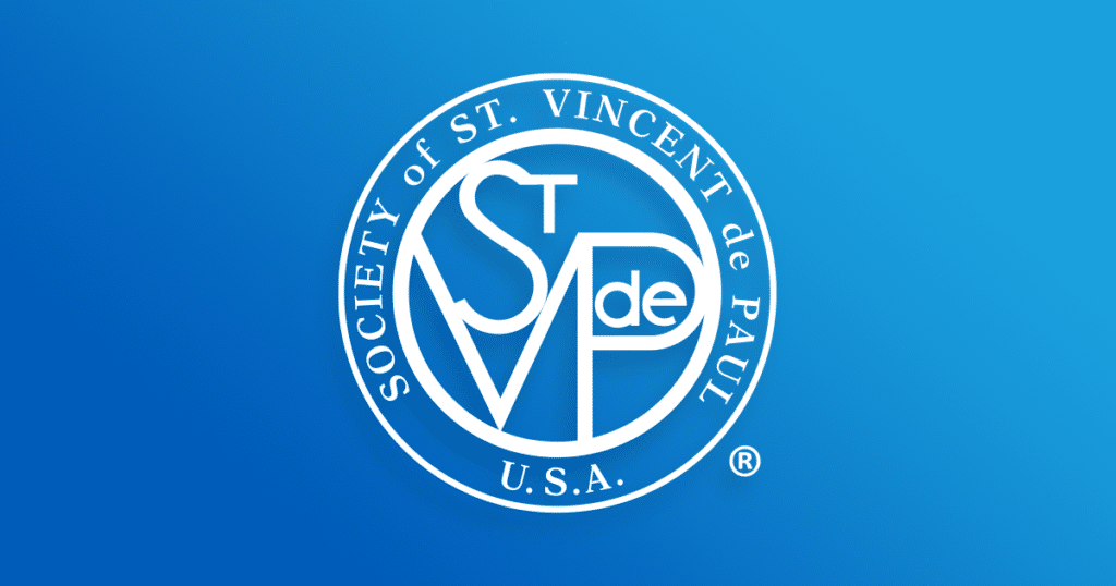 Society of St. Vincent de Paul circular blue and white logo.