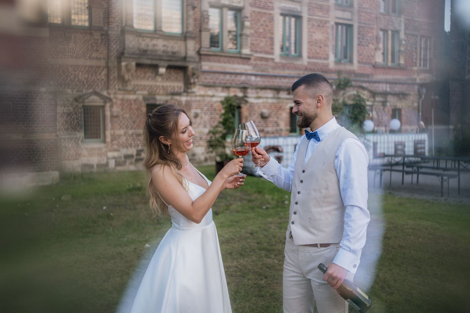 Romantic wedding sequence against historic stone architecture.