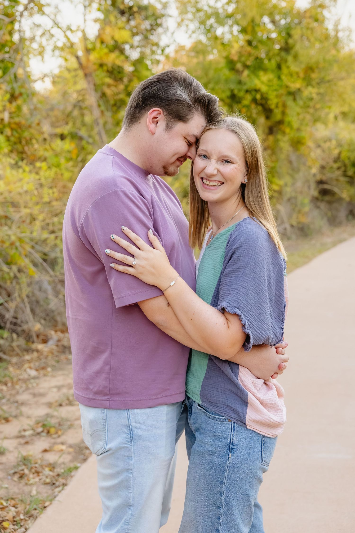 married couple in a field at golden hour in buffalo gap texas photography session