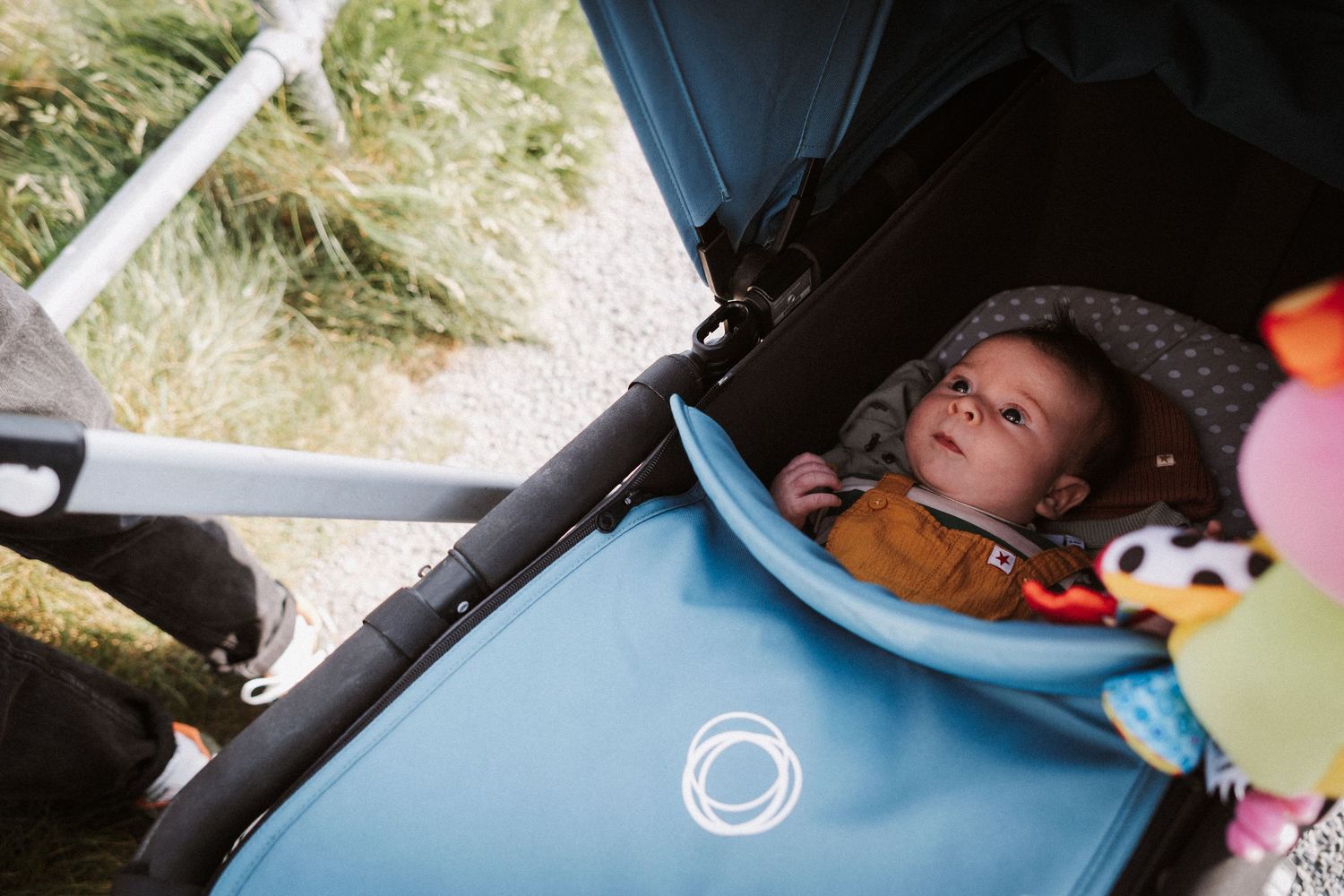 A series of six photos showing a child sleeping in a car seat during a road trip.