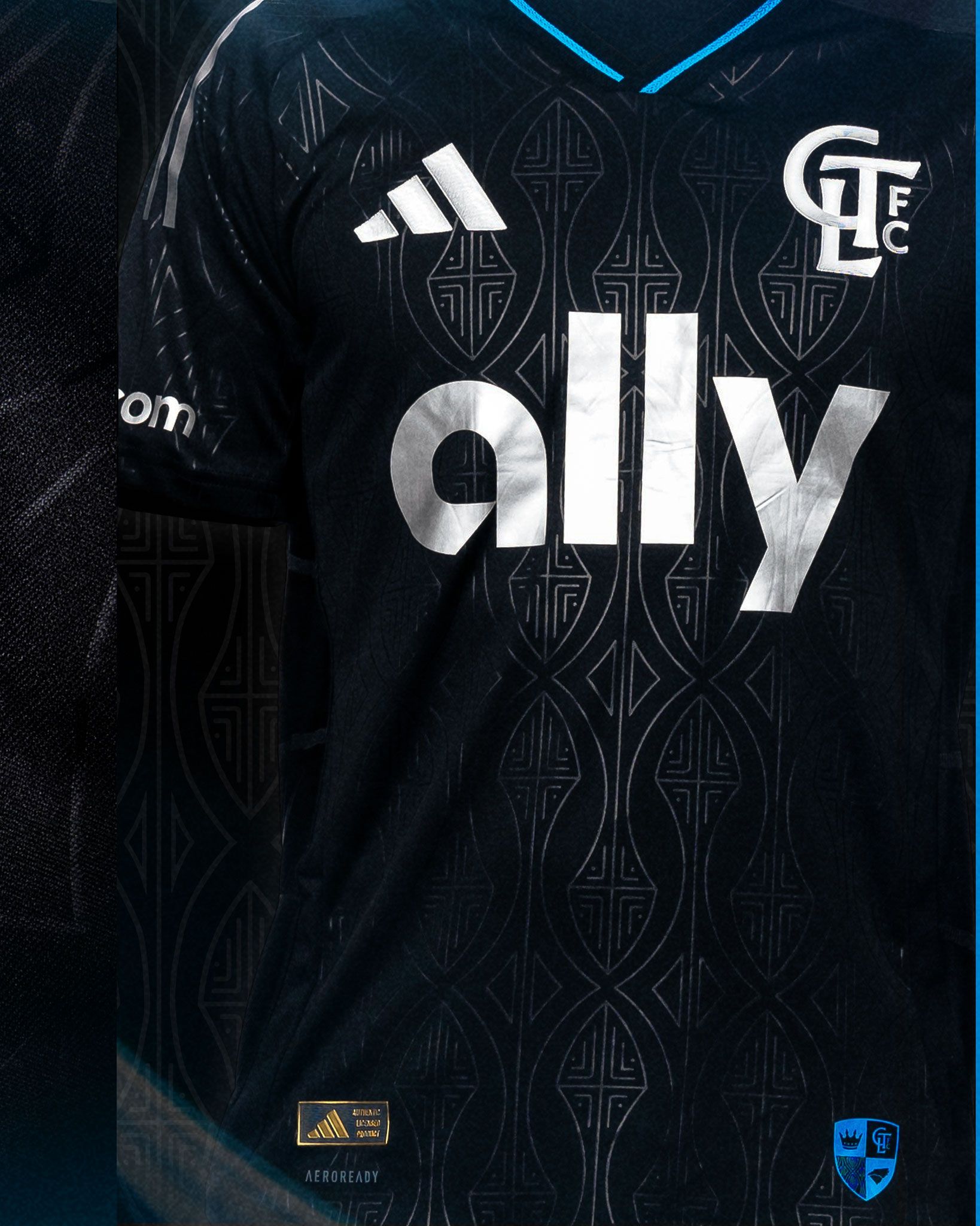 Charlotte FC black Adidas Fortress Kit jersey with ally sponsor and blue collar detail.