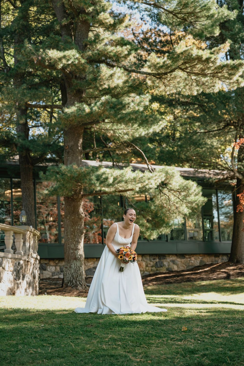 A sequence of outdoor wedding photos capturing moments in a sunlit garden setting with pine trees.