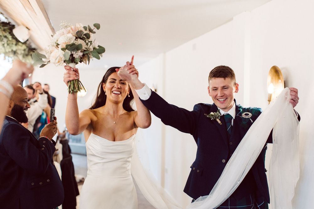 A series of joyful wedding moments showing couples dancing and celebrating at an elegant indoor reception.