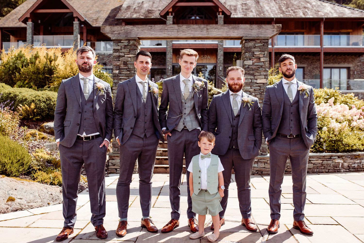 Midday group wedding photo at Lodore Falls