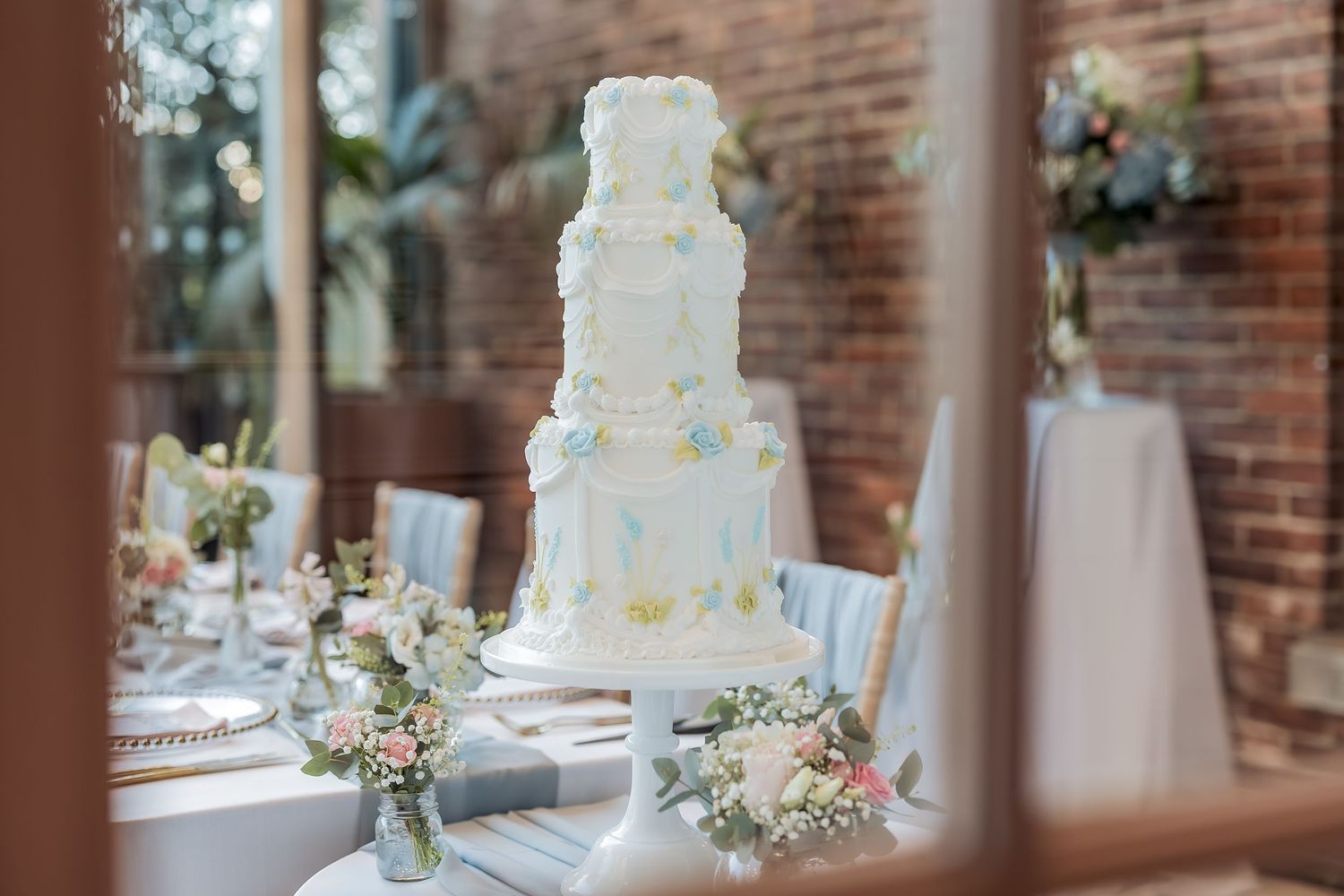 Charlotte House wedding cake and table settings for a styled shoot.