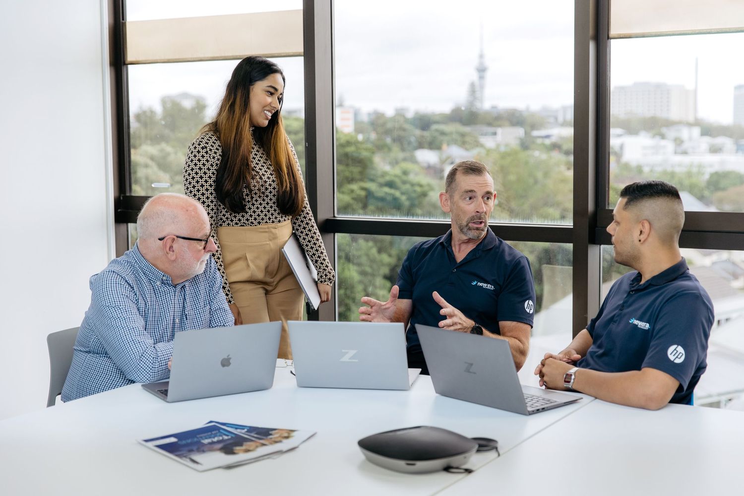 Team meeting photographed for company branding