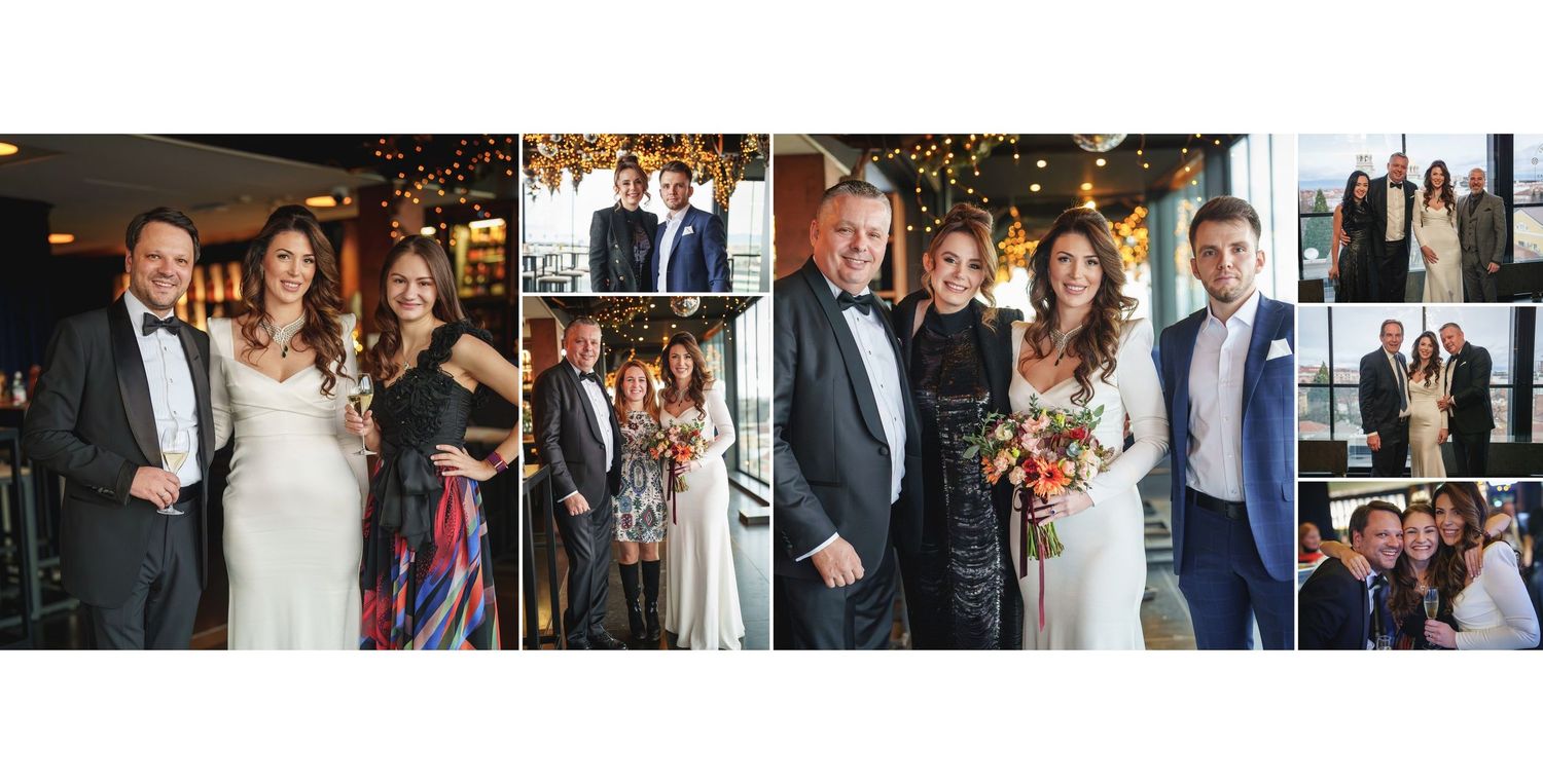 Wedding party poses together in formal attire during outdoor celebration with decorative lighting and floral arrangements.
