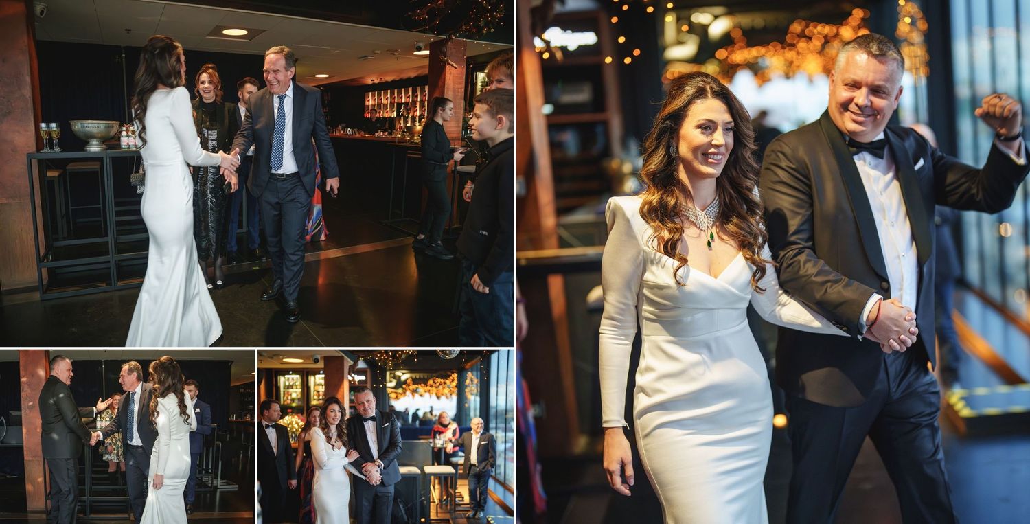 Wedding couple shares intimate moments in modern venue with ambient lighting and city views.