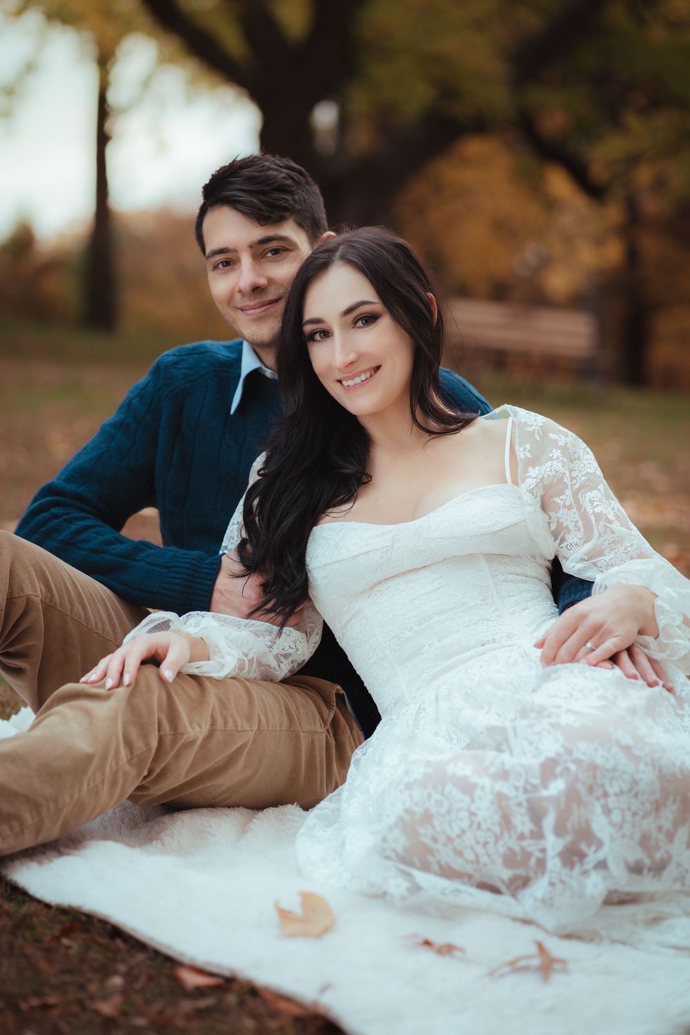Romantic couple portrait during an outdoor fall engagement session.