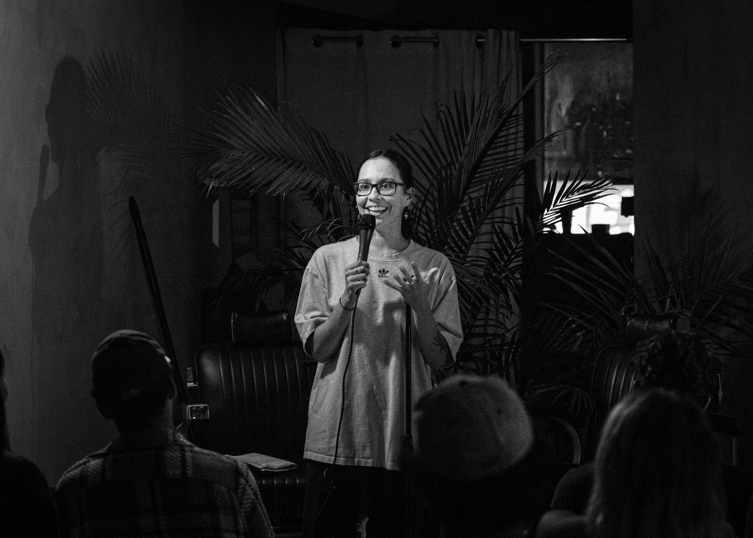 Event photography capturing live moments from the 'Mess Produced' comedy show with performers on stage