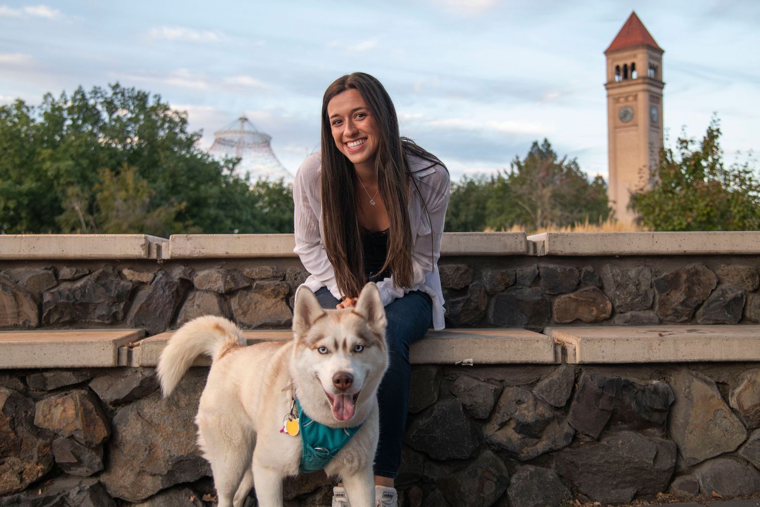 Riverfront Park Spokane, Spokane senior portrait, girl sitting downtown Spokane with her dog
