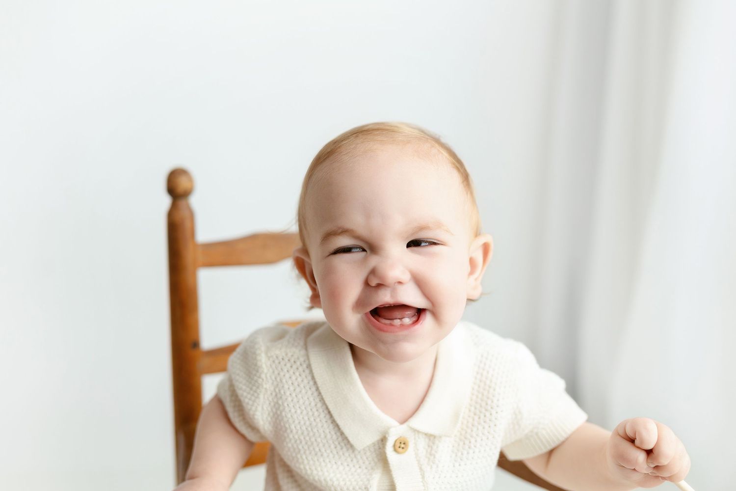 A little boy during his milestone session smiling very big. Greenville SC milestone Photographer, Easley, SC newborn photographer