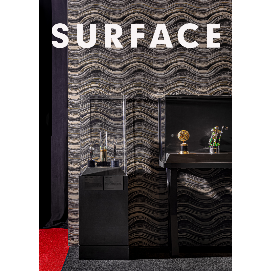 Heather Ison Photography for Surface. Contemporary room featuring dramatic wavy patterned wallpaper and black console table.
