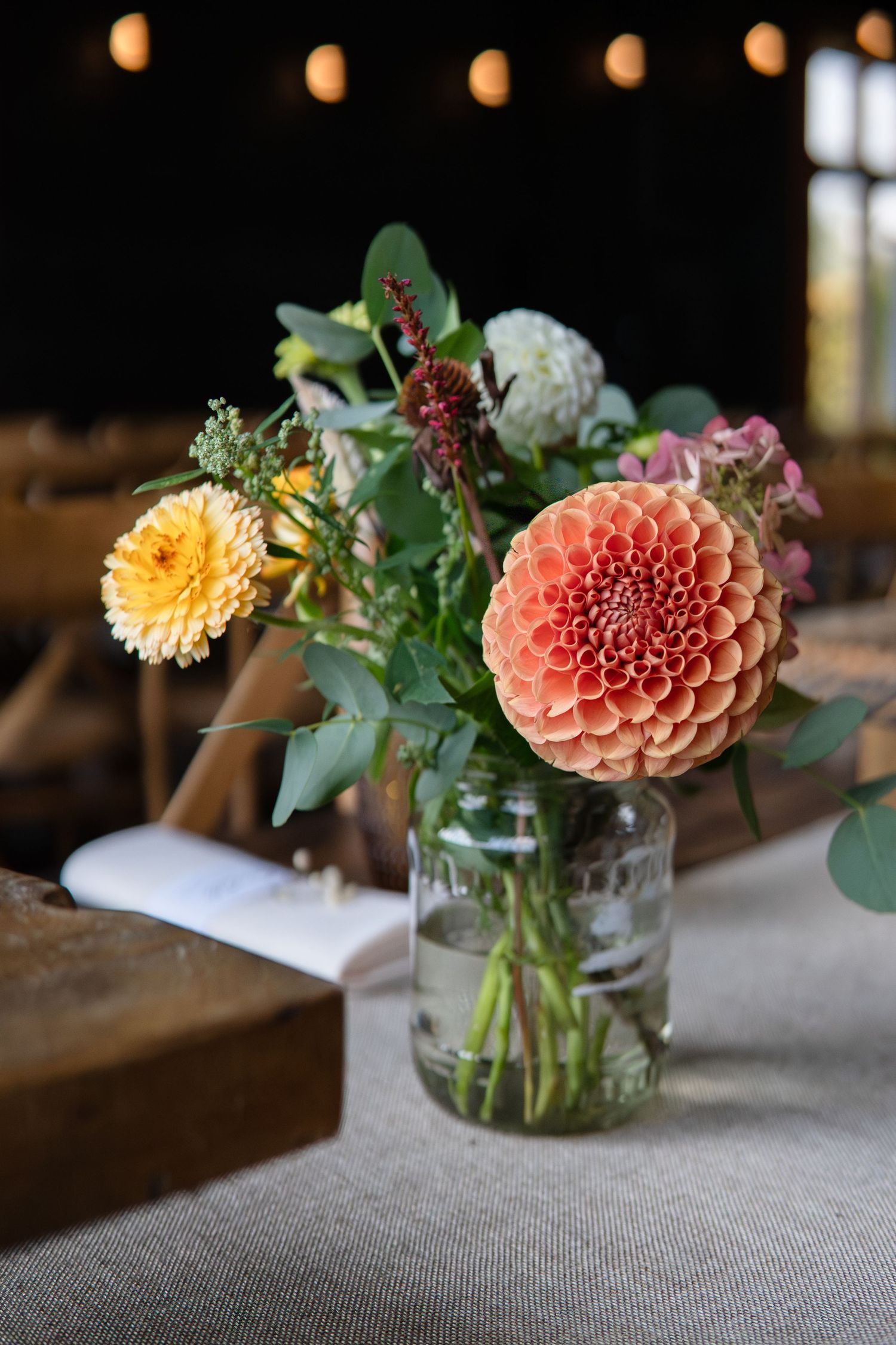 Jars of locally grown blooms from a flower grower in Kent | Flowers created by BLOOM Fabulous | A Kentish wedding