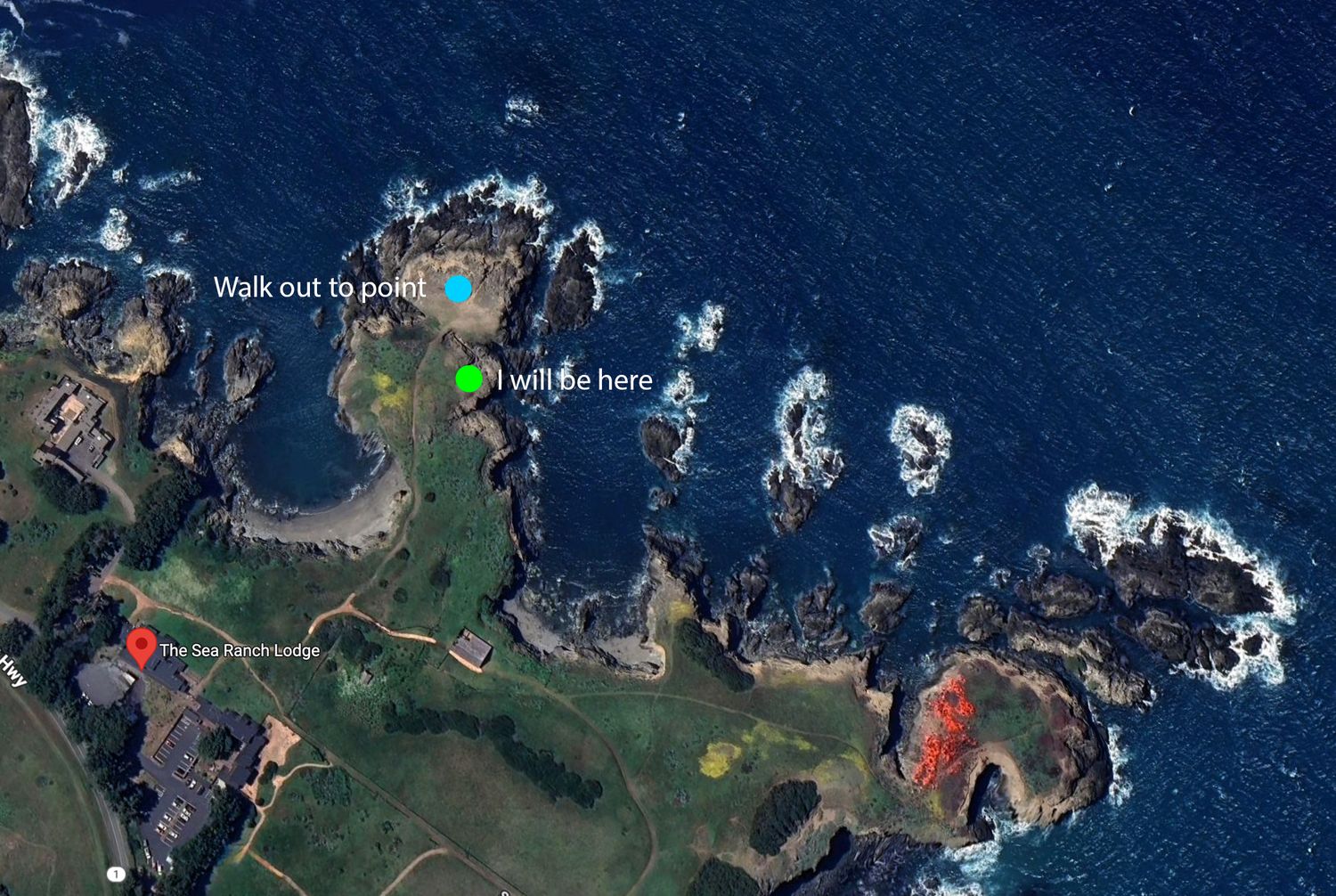 Aerial view of rugged coastline with rocky cliffs and blue ocean waters during daytime.