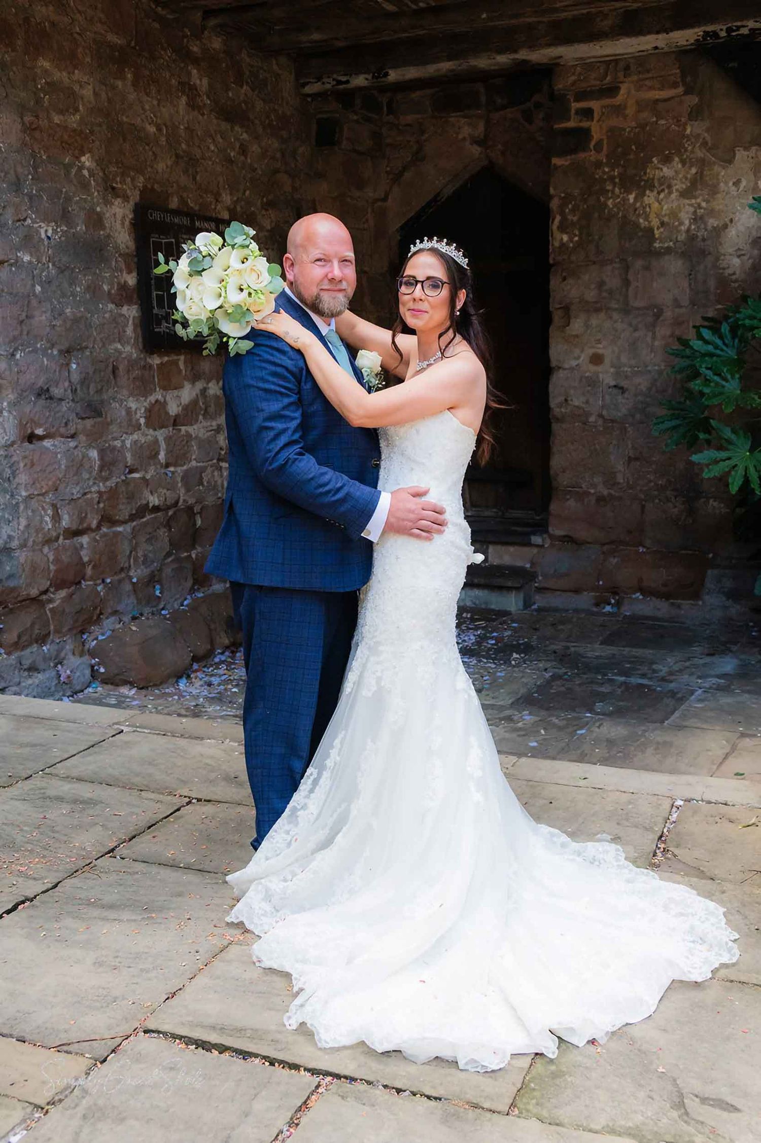 Romantic outdoor couple portraits at Cheylesmore Manor by award wining wedding photographers
