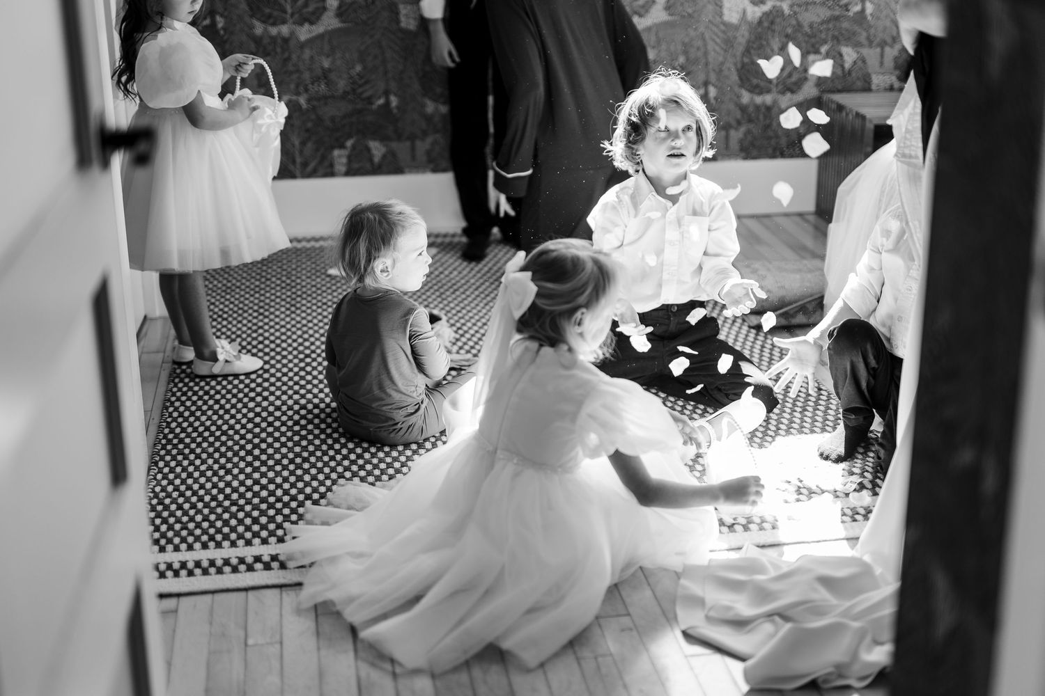 Black and white photo collage showing multiple chess matches and tournament scenes in progress.