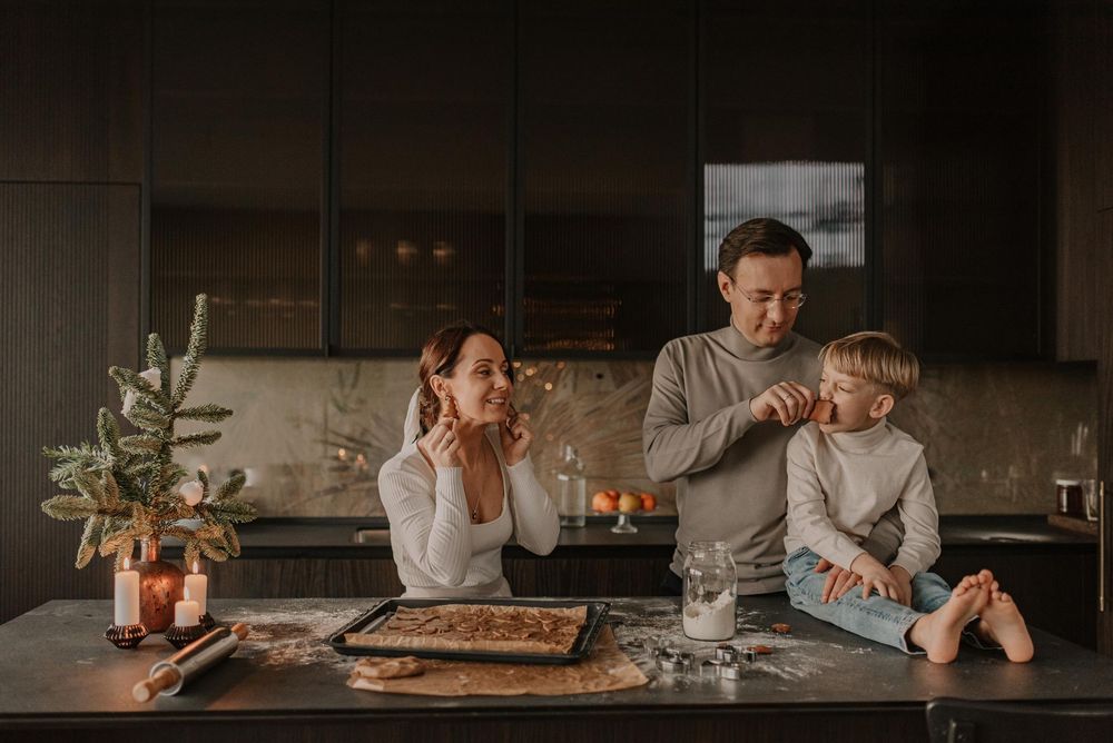 A series of cozy kitchen scenes showing hands preparing food and drinks on rustic wooden surfaces.