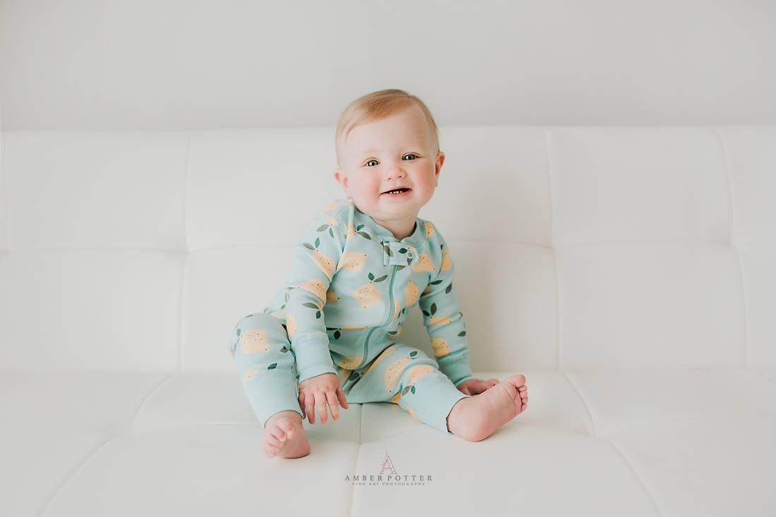 Child portrait sitting on couch - Amber Potter Photography.