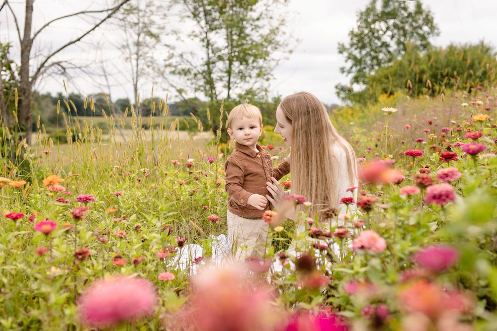 Mommy and me photos among colorful flowers during summer mini sessions at First Roots Flower Farm in Oconomowoc, Wisconsin.