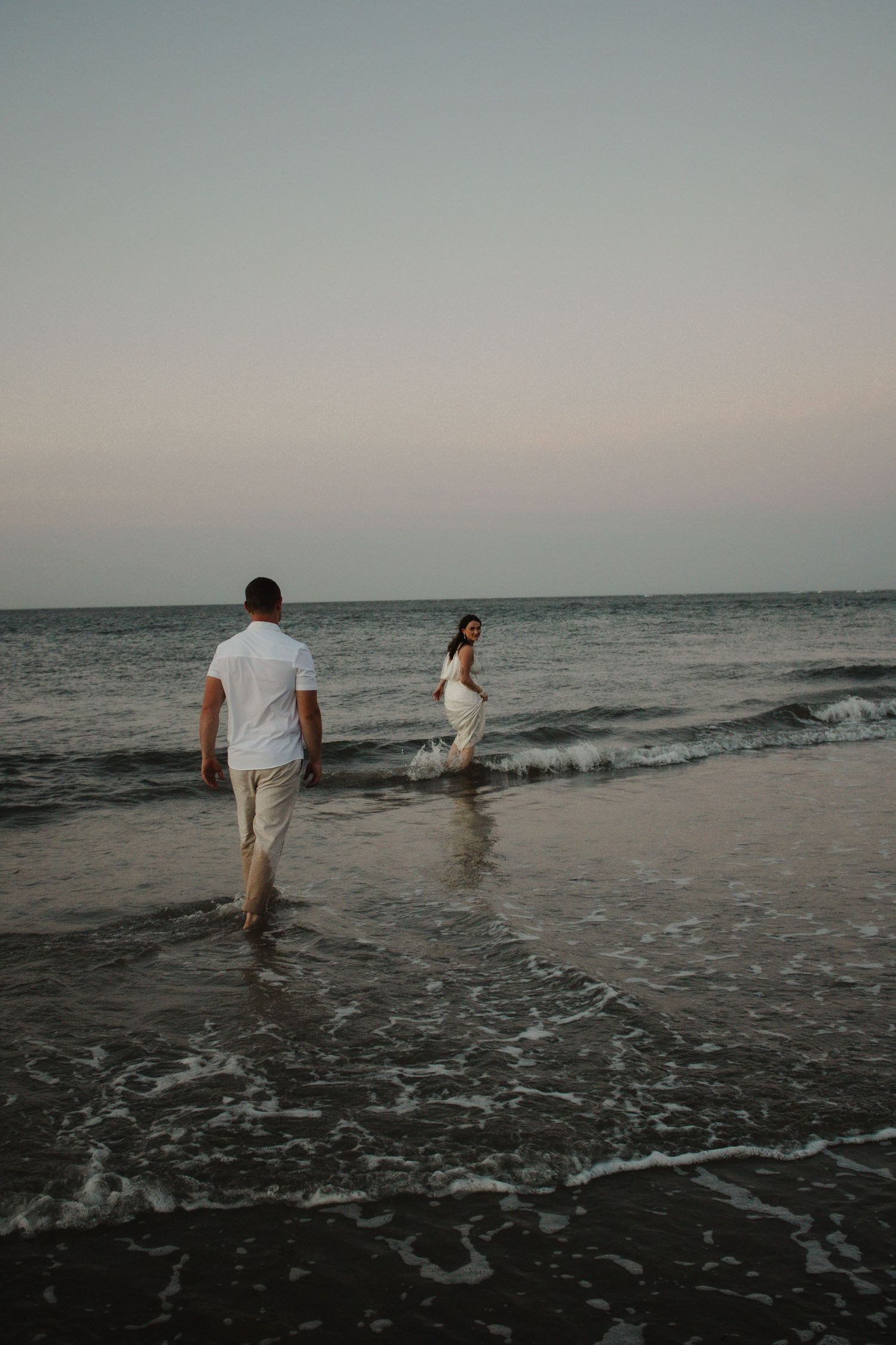 couples holding hands walking on beach, elopement, Cincinnati, northern Kentucky, travel photographer, beach elopement