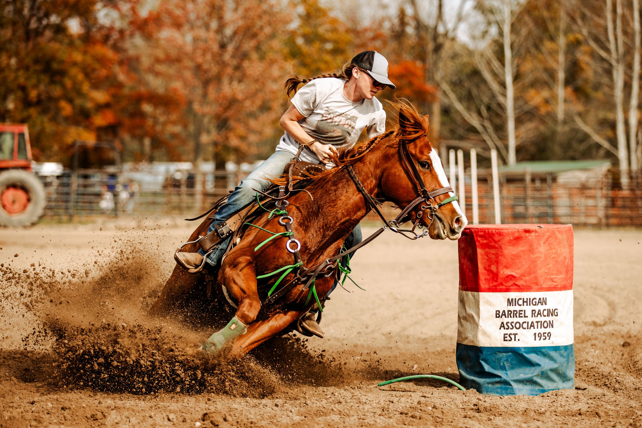 A series of action shots showing barrel racing at a rodeo event with horses kicking up dust in autumn scenery.