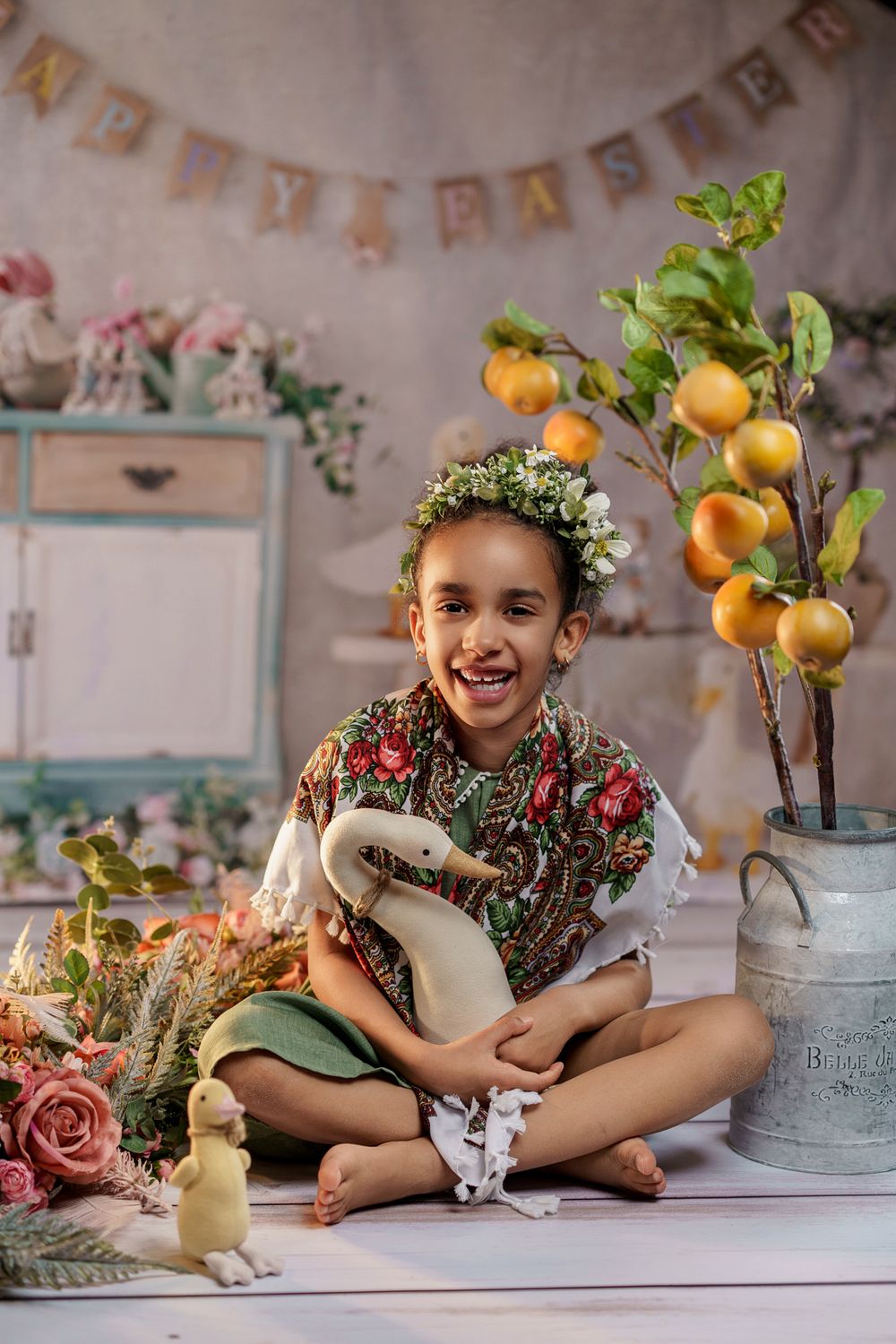 A festive Easter scene with floral decorations, citrus branches, and rustic decor.