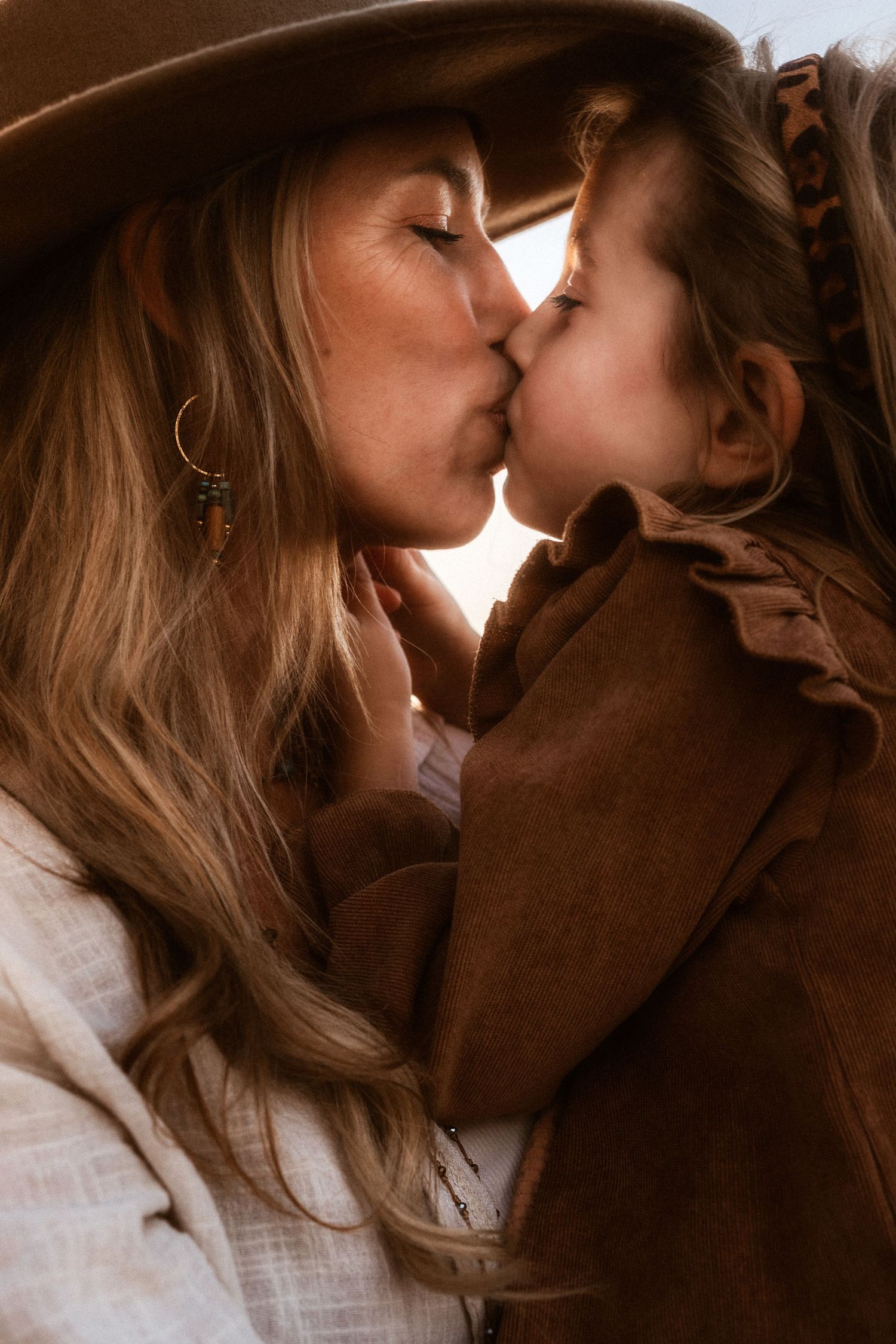 family session photographer in Javea, sweet moment between a mother and a daughter. Javea family photographer