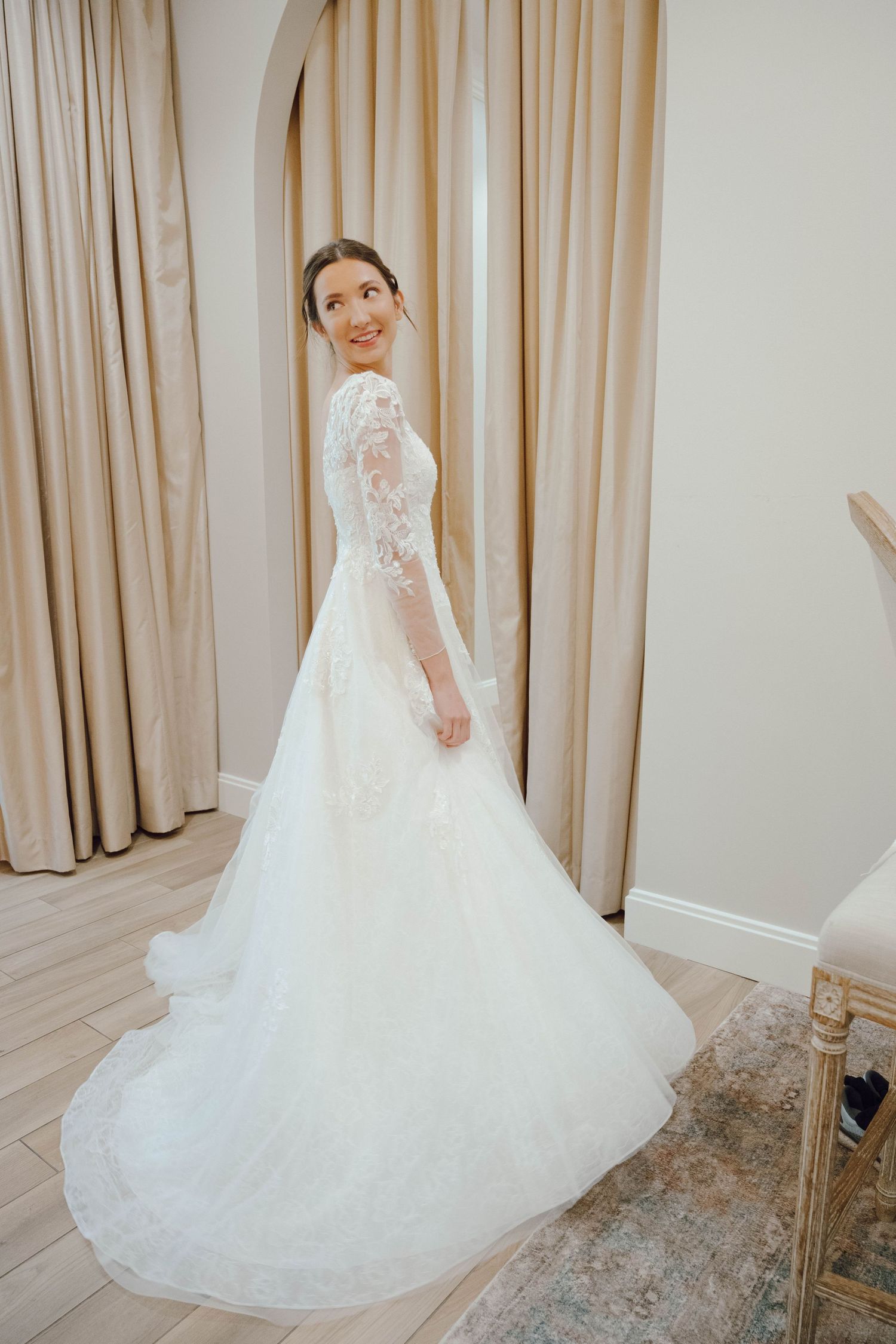 Series of elegant bridal portraits showing the flowing movement of a white lace wedding gown with train.