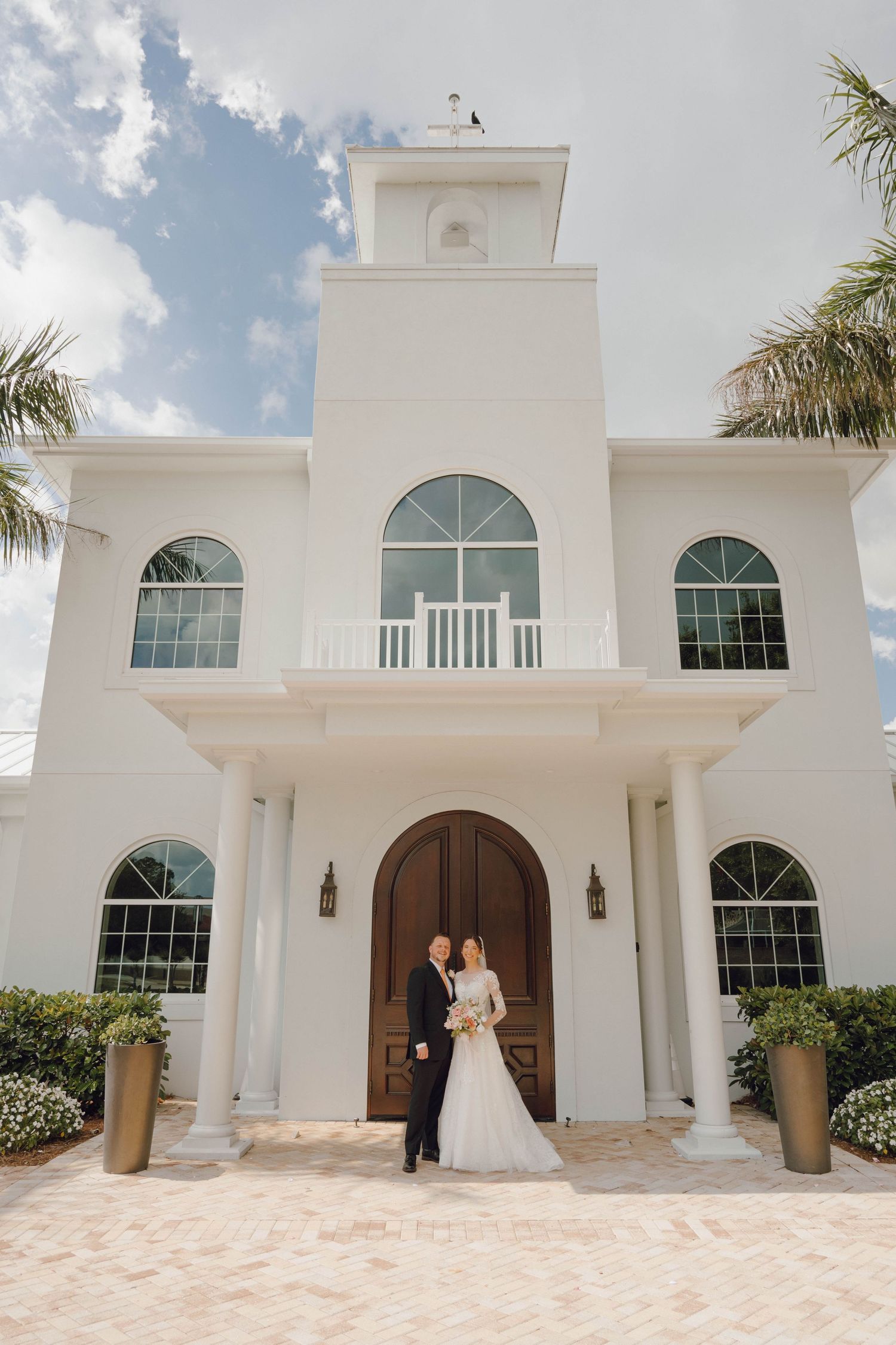 Elegant white church exterior with arched windows and doors captured in sequence showing different angles.