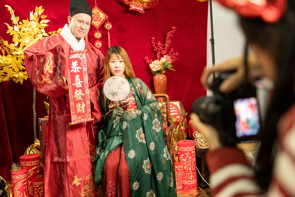 Lively New Year Hanfu market stall event photography capturing cultural portraits and interactions, by an Auckland photographer.