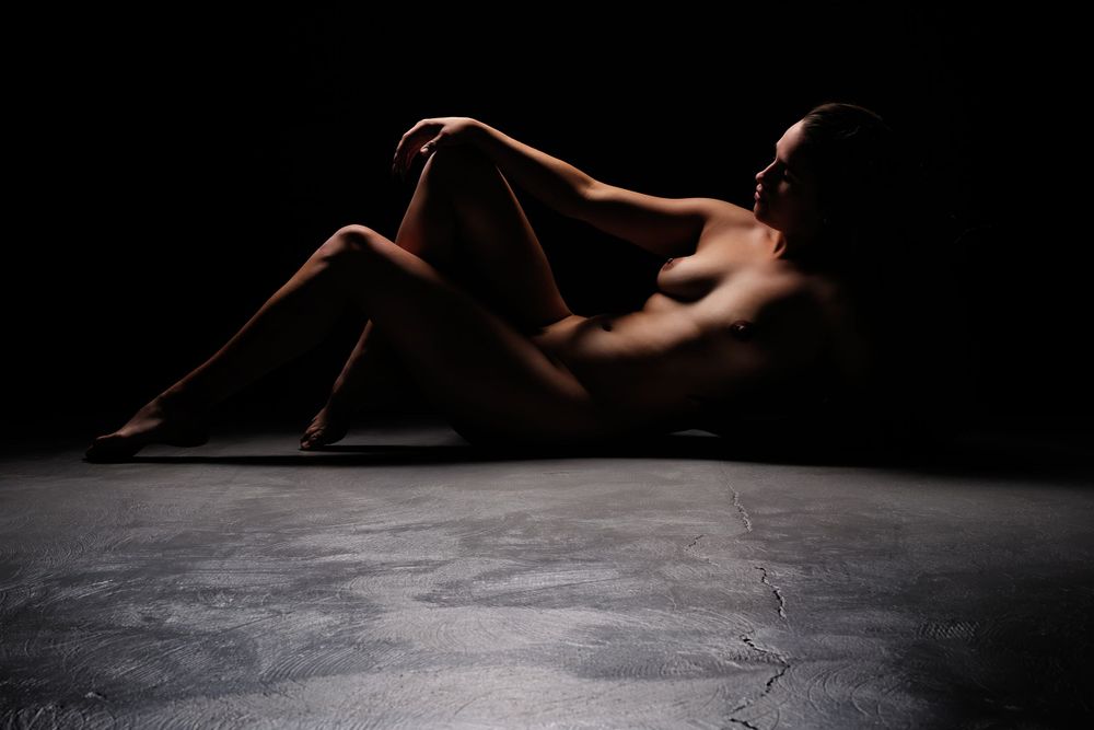 David G Holt Photography - Minimalist low-key photography series exploring form and shadow on dark background.