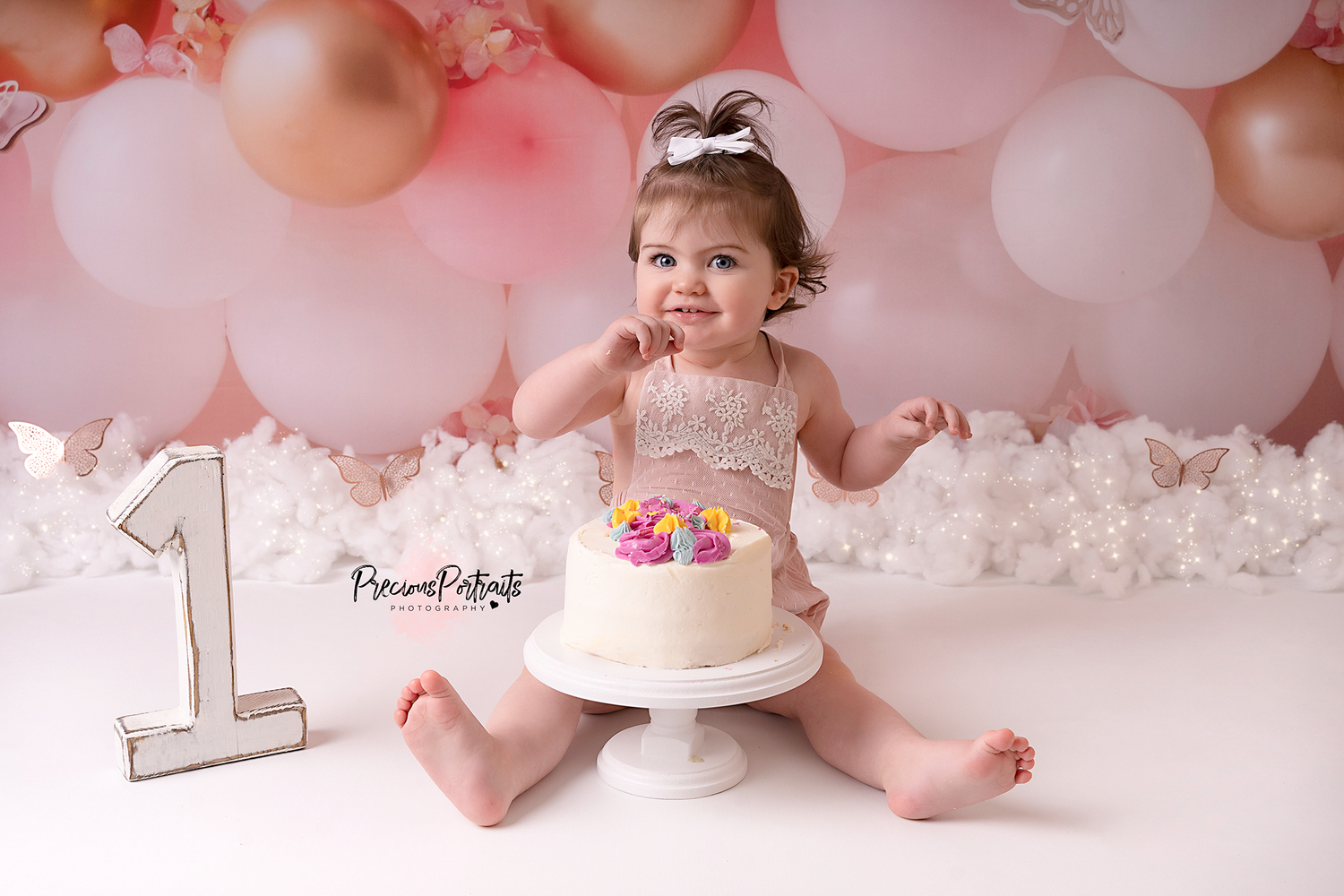 happy to eat and enjoy smiles with a fun filled cake smash