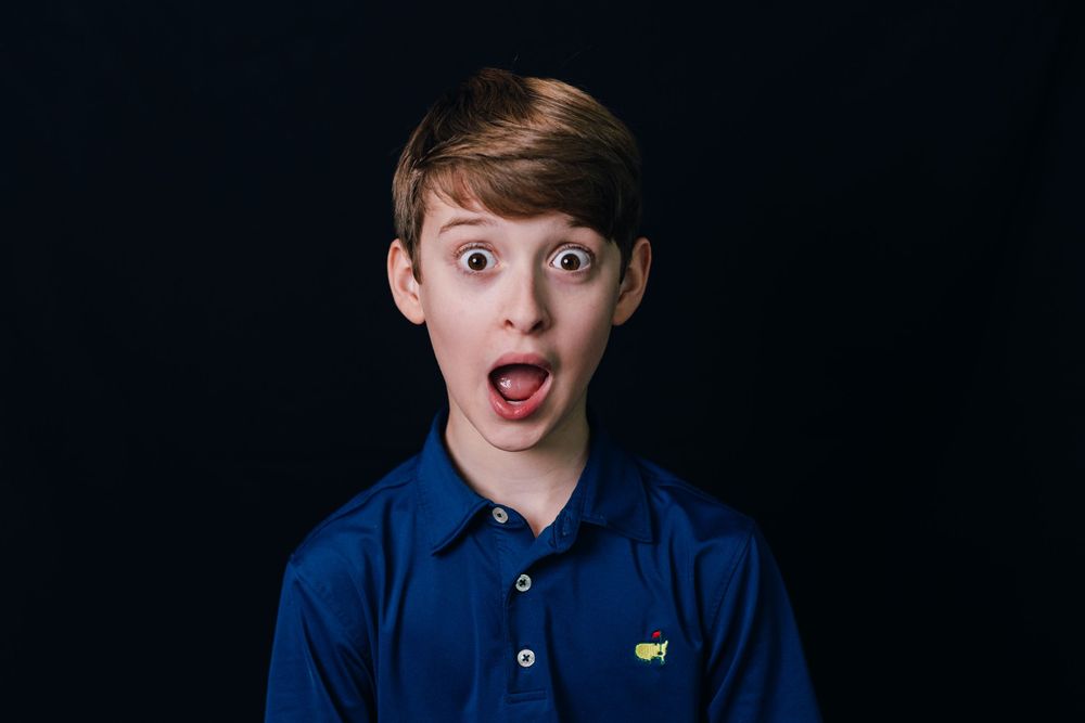 Six headshot photos arranged in a row showing different facial expressions against a dark background.