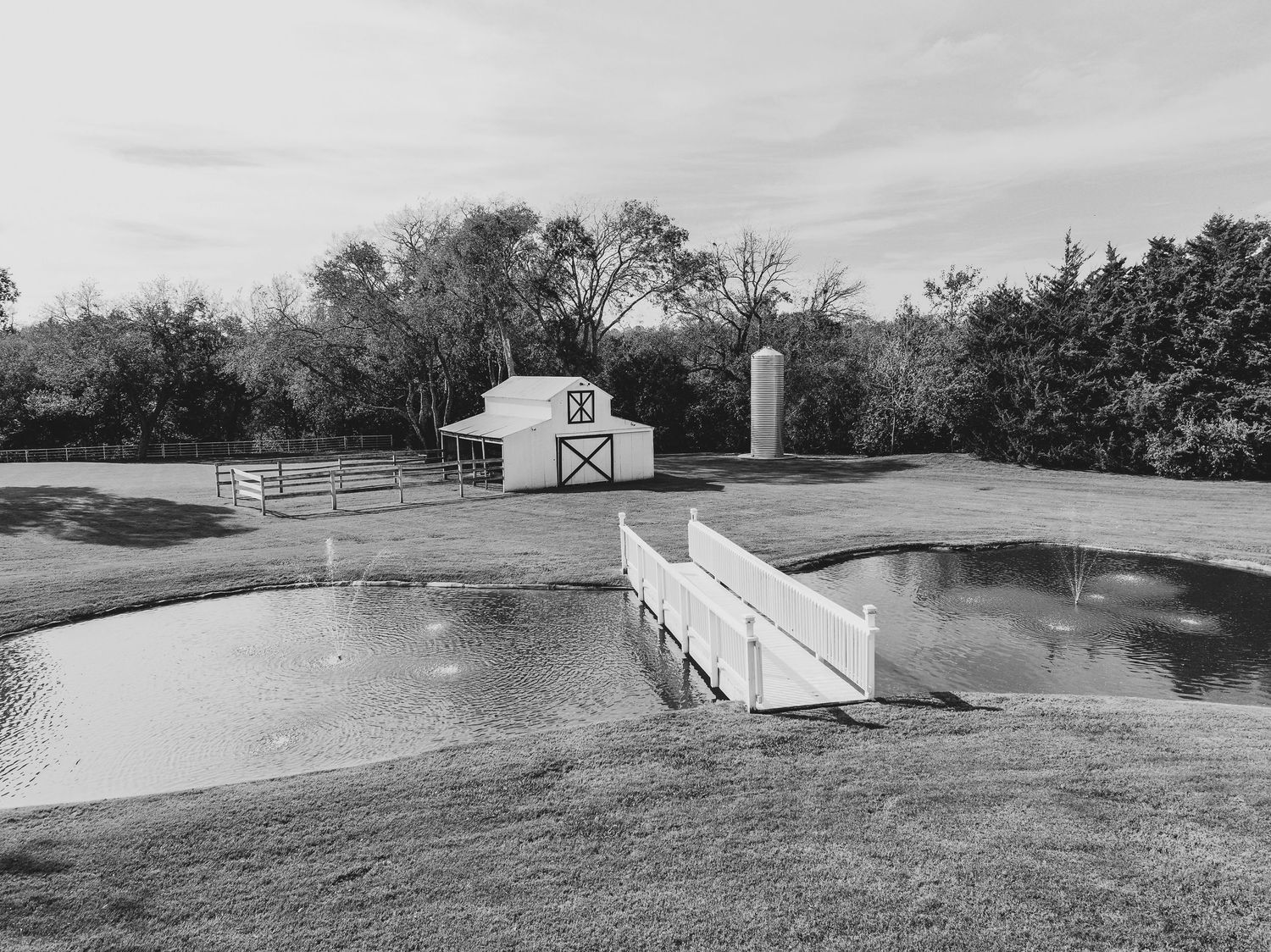 Wide view of Firefly Gardens ceremony space prepared for a spring wedding