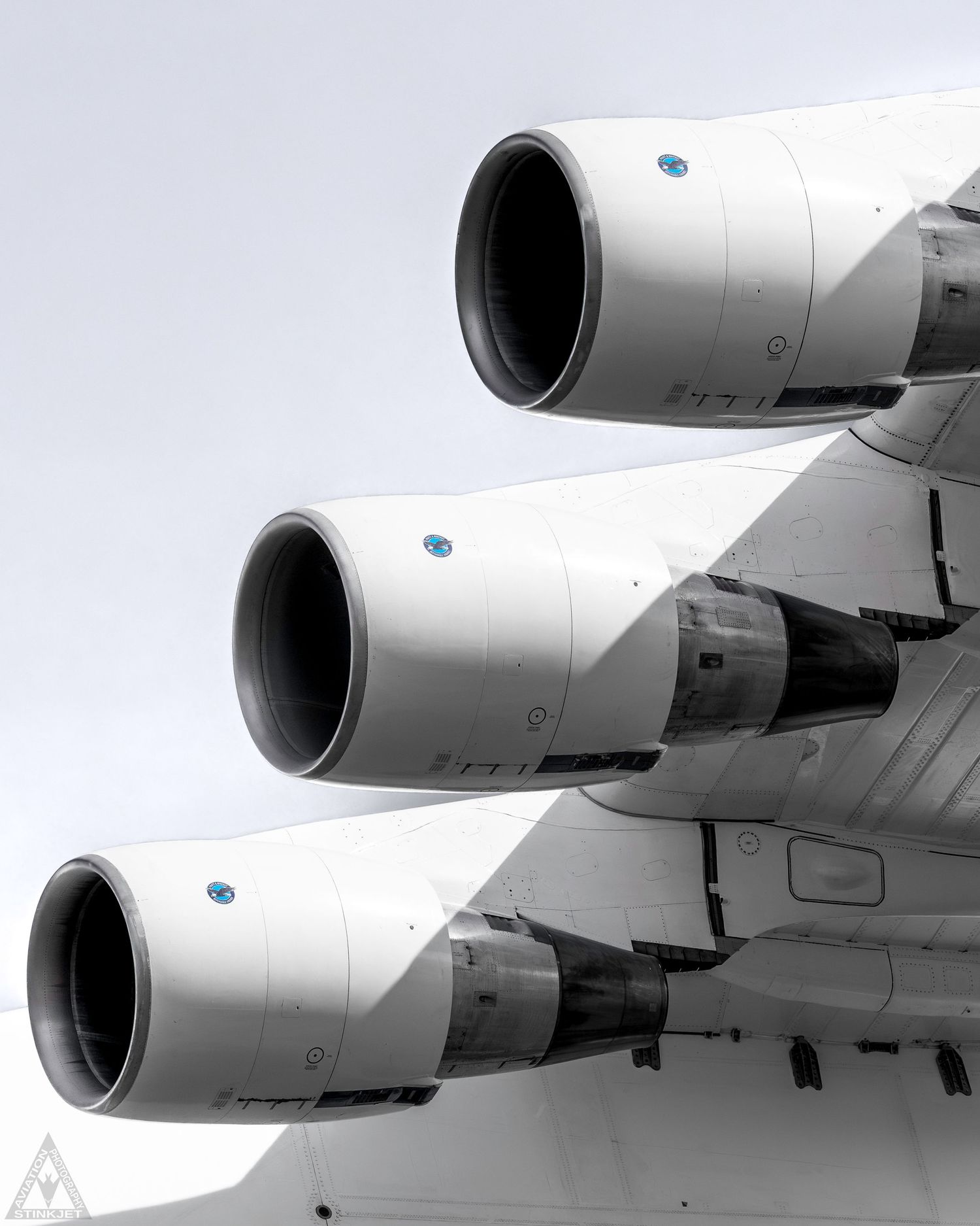 Three of six engines present on the Stratolaunch Roc aircraft as it flies overhead