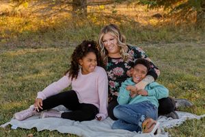 family of three full of giggles