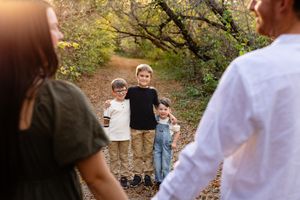 brothers looking at mom and dad
