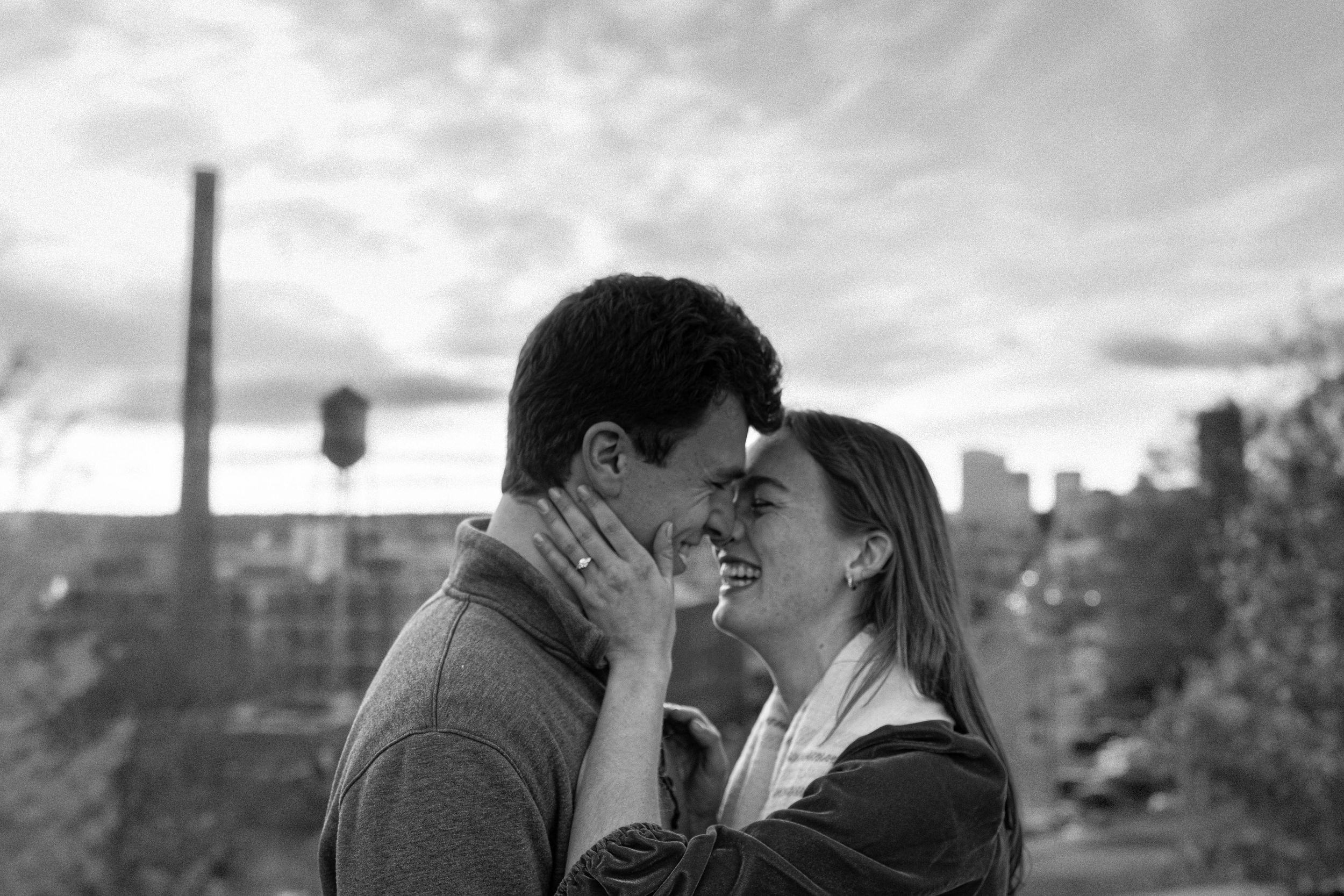 Black & White Engagement at Libby Hill Park in Richmond, Virginia with the city of Richmond in the background.