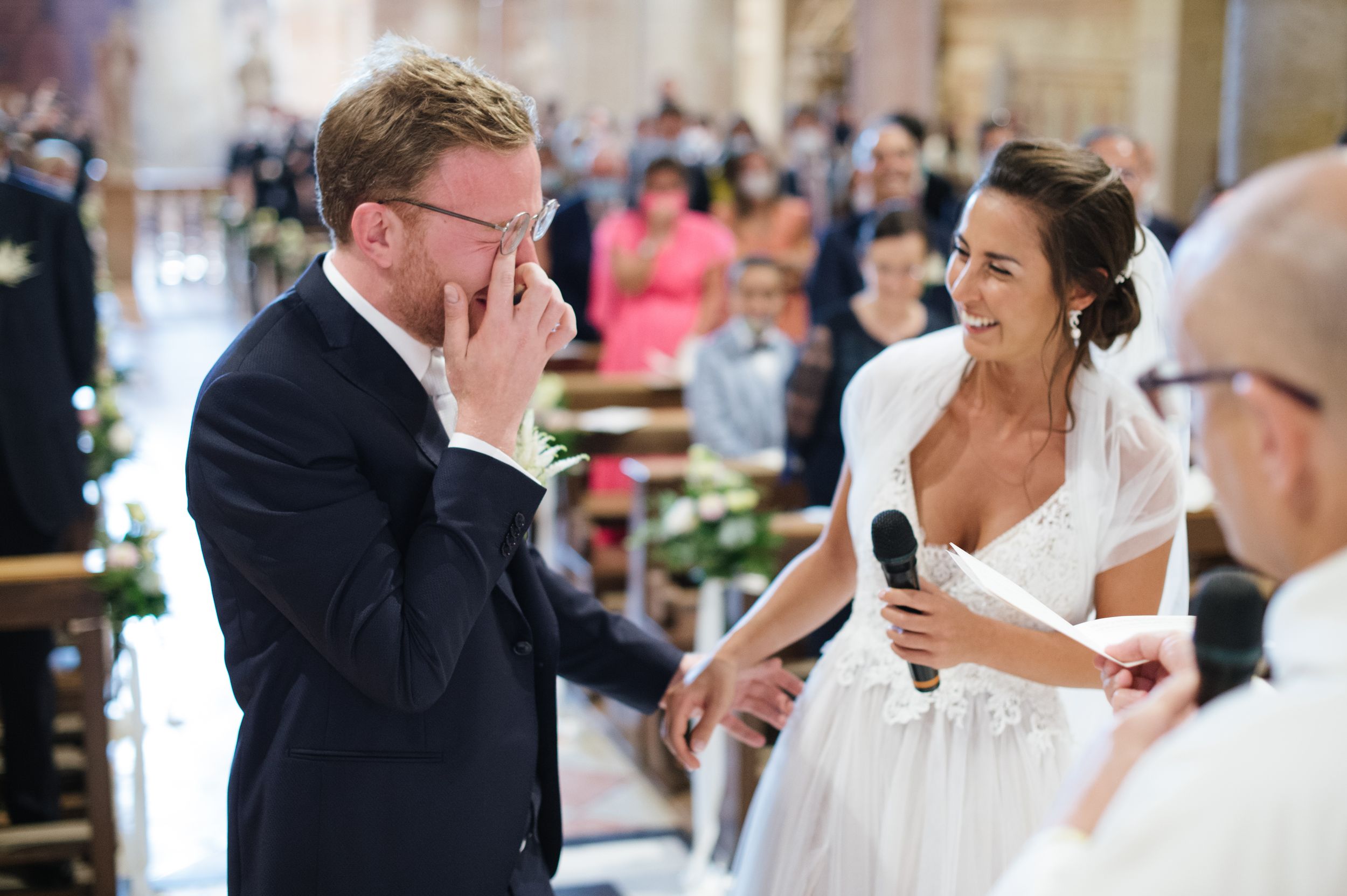 Emotional moment of wedding ceremony inside Basilica di San Zeno in Verona, Italy