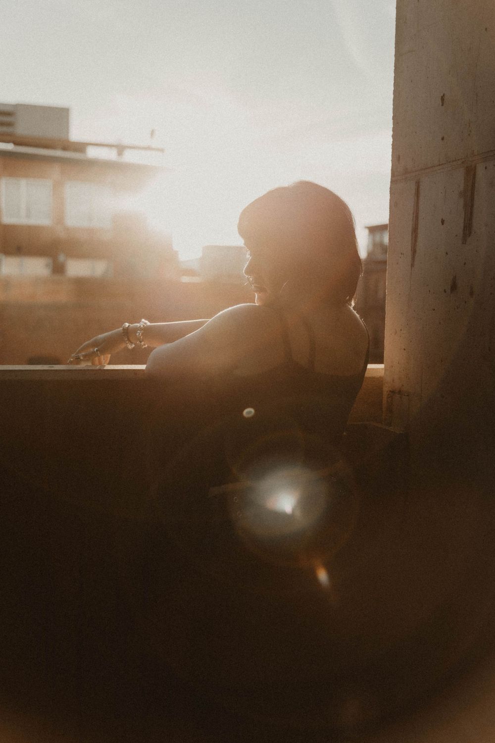 Girl in a parking garage for moody, cinematic, urban, portrait, senior photos in Denver, Colorado outside, urban, and nature photos