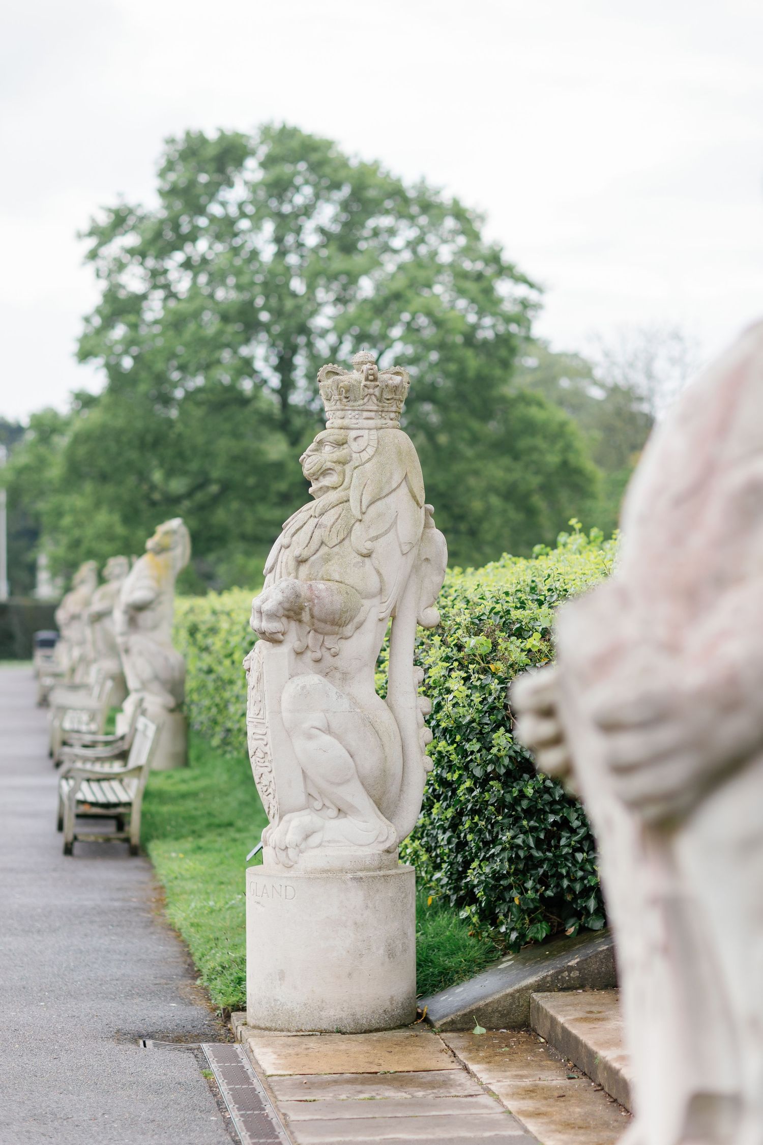 Statues in front of The Palm House at Kew Gardens